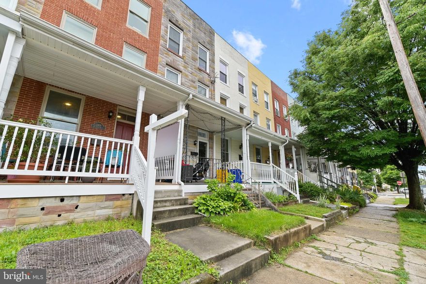 This beautifully renovated and enormous four bedroom with three and a half  bathrooms sits   right in the heart of Hamden just one block away from The Avenue (36th Street) shopping and dining. In addition to the four bedrooms on the upper levels there is also an enormous finished basement. This is one of the largest homes in Hamden! All of the bedrooms are large and evenly sized.Go up to the roof deck for a view that shoots all the way over to the Inner Harbor and Towson or down to the back patio for all of your outdoor entertaining needs. Enjoy the luxury of two car parking with a wide entrance for easy parking. This home has all of the highest equity finishes including hard wood floors throughout, modern finishes and fixtures, and a dual zoned HVAC system that heats and cools the entire home effortlessly. Granite countertops, stainless steal, and over 3,000 square feet of above grade square footage. This one won't ask long!