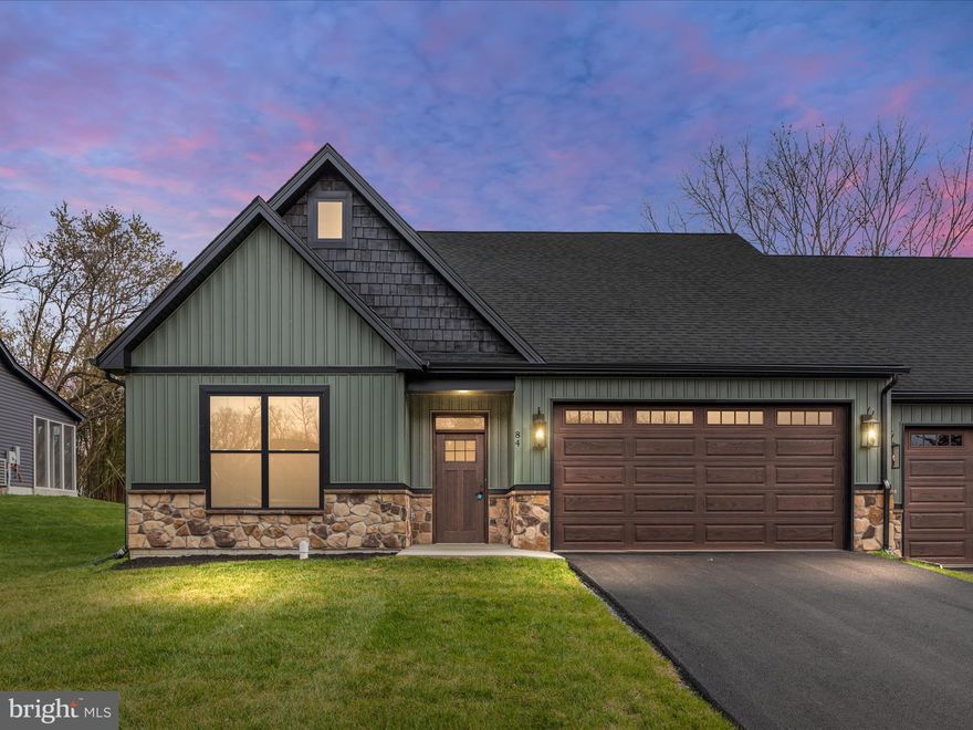 BRAND NEW, FINISHED, and READY TO BE YOURS! First-floor, low-maintenance living just minutes from the downtown area of Shepherdstown! Love where you live and enjoy a short stroll or bike ride to town, new library, Morgan's Grove Park, local schools, Shepherd University, and all the quaint shops and eateries. This 3 bedroom, 3 bath villa floor plan offers first-floor living with all your modern conveniences and a special dining room option!  The open kitchen floor plan connects the dining room, living room and kitchen which is highlighted with a nicely-sized kitchen island and appliances set for refrigerator, dishwasher, stove and double oven. The living room offers nine foot ceilings and a fireplace with direct access to the rear covered, screen porch that's perfect for outdoor serenity or entertaining. There is a conveniently located laundry room located just off the primary bedroom. The spacious primary bedroom suite offers a walk-in closet and cathedral ceilings that connect to the primary bathroom. The primary bath is tiled and has a double vanity and a conveniently accessible glass-enclosed shower and soaking tub.  Continuing on the main level, there is a second bedroom with ample closet space and a full bathroom with tub and shower.  Upstairs, is a nicely finished third bedroom with closet space and a full bathroom.  A two-car garage completes this newly built villa.  Book your showing today while these remaining villas last!