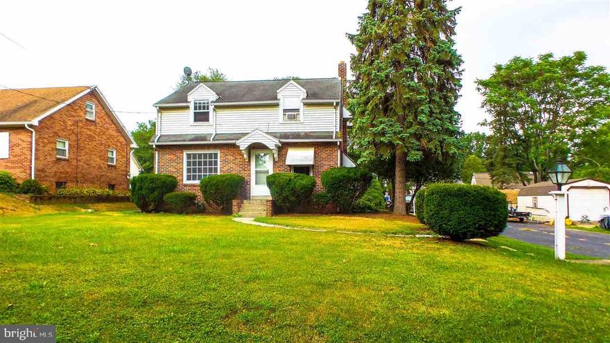 Solid brick, freshly painted Cape cod in central schools on a level lot w/detached 1 car gar.  Frplc in LR, Hrdwd flrs, new laminate in kit & Full ba, all hrdwd elsewhere.  Incl refrig/freezer, freezer in bsmt, dishwasher too!  Move in ready!  Concrete cellar doors to backyard, rear covered porch, workshop & storage in bsmt, new 200 AMP elect too!  Close to 83!