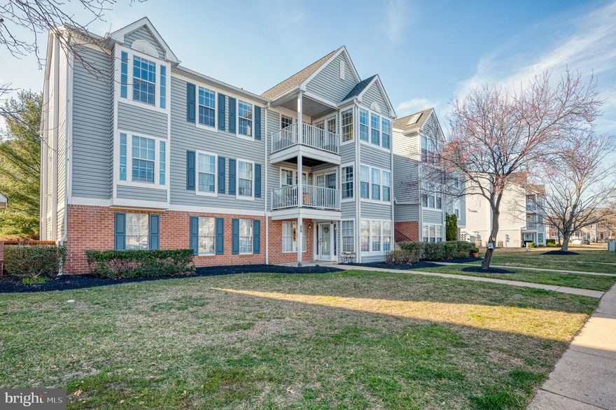 **We are in receipt of multiple offers and the seller is requesting a best and final deadline for highest and best offers due Monday April 10th at 5pm.**  This stunning 2 bedroom, 2 bath top floor condo in White Marsh offers the ultimate in one floor living, providing both convenience and comfort. The spacious balcony is perfect for enjoying the outdoors and provides a serene escape from the hustle and bustle of everyday life. The vaulted ceilings create a feeling of openness and space, adding to the overall sense of relaxation. The updated kitchen is equipped with top-of-the-line stainless steel appliances, making cooking a breeze. The primary bedroom is a tranquil retreat, complete with a spacious walk-in closet and private bathroom. Hardwood flooring throughout the condo provides a luxurious touch and easy maintenance. The secure main entrance provides peace of mind, while the attic offers ample storage space, allowing you to keep your living area uncluttered and organized. This condo truly has it all, with modern conveniences and a serene atmosphere that will make you feel right at home. Don't miss out on this opportunity to experience comfortable and stylish living in this beautiful top floor condo.