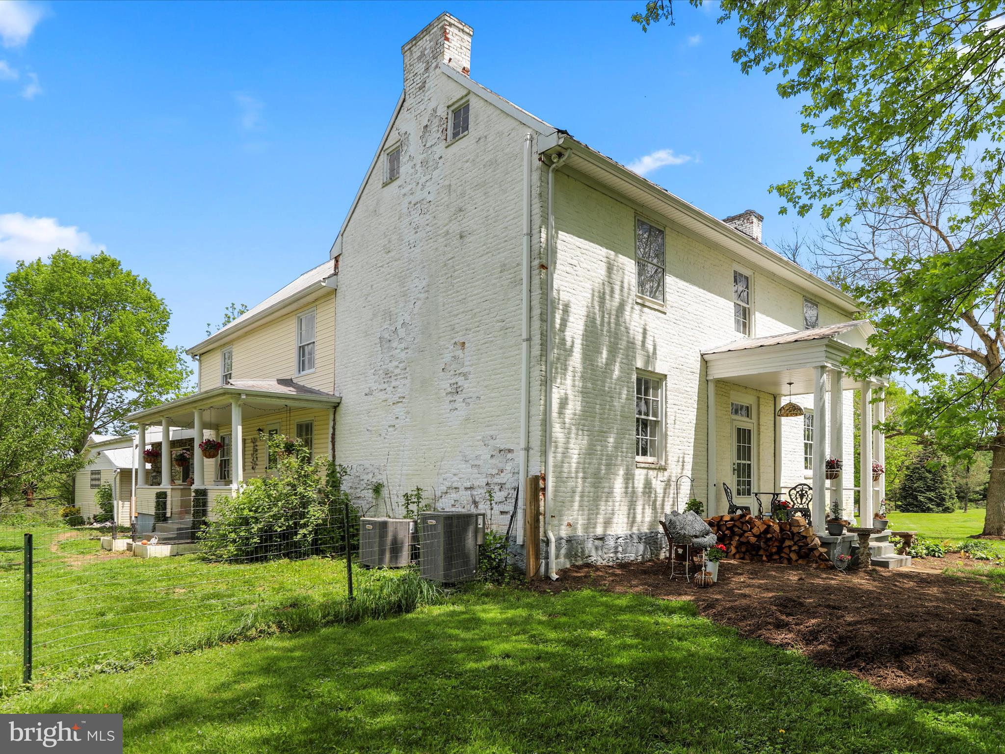 If you're craving a farmette lifestyle without giving up city conveniences, 177 Elsie Drive in Kearneysville, WV offers the best of both worlds. Just minutes from I-81, shopping, and dining, this 6.47-acre historic retreat is perfectly situated for commuters heading to Northern Virginia, Maryland, or D.C.—yet it feels a world away. Tucked within a well-kept neighborhood of maintained homes, the property is both private and connected, offering a rare blend of rural charm and modern access. Property does have Opequon Creek frontage with opportunity to be developed/improved for easier access.
This enchanting four-bedroom, two-bath homestead dates back to the 1780s, with hand-hewn logs and bricks crafted onsite, and thoughtful additions that respect its architectural legacy. Listed on the National Historic Register, the home features original fireplaces, wide-plank floors, exposed beams, and custom stonework—plus modern upgrades like a standing seam metal roof and updated systems including two Lennox heat pumps. The gourmet kitchen is a true showstopper with a 6-burner Viking gas range, double ovens, farmhouse sink, oversized island, and cozy built-in seating.
Outside, enjoy open meadows, hay fields, raised garden beds, mature trees, and lush landscaping. A well-built chicken coop, detached two-car garage, storage sheds, and brick walkways complete the farmette dream. With agricultural/commercial zoning and a 50% property tax discount, there’s room to live sustainably or launch a small business.
The property also includes access to a shared 5-acre community lot with a pavilion, picnic area, and creek access for kayaking or tubing—adding a recreational bonus to the lifestyle. Whether you’re entertaining guests in the generous indoor spaces or savoring the quiet beauty of outdoor living, this home delivers on charm, functionality, and flexibility.
Historic, soulful, and set up for modern life, this is a rare chance to own a timeless piece of Jefferson County. Schedule your private tour and explore the possibilities.