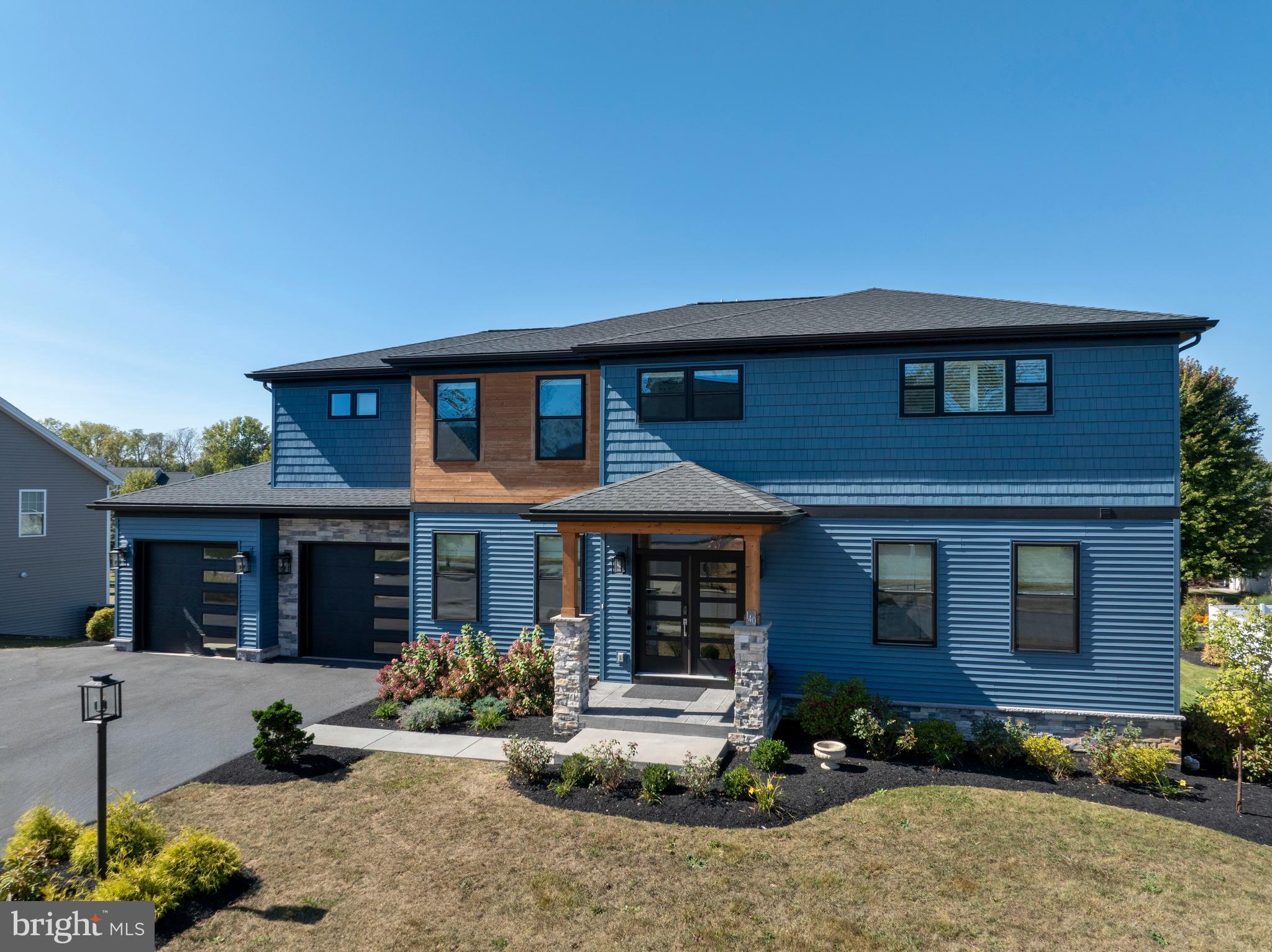 OPEN HOUSE - Saturday, September 20th, 1:00 - 2:30 PM. Welcome to 140 Pepperberry Lane, a stunning Gem built home located in the highly desirable Stearns Crossing neighborhood. This modern Craftsman-style single-family home is a true masterpiece of design and craftsmanship, boasting an array of luxurious features, hickory hardwood floors, dual HVAC systems, covered composite deck, and an impressive 6 bedrooms and 5 full baths.
As you step through the front door, you are greeted by an open and airy atmosphere throughout the home. The home’s modern kitchen, open to the dining area and family room, is a chef’s dream, with a large island, quartz countertops, custom Amish-made solid wood cabinetry, upgraded stainless steel appliances, including a large Wolf gas cook top, and a large pantry. The family room is a cozy retreat featuring a gas fireplace and ample natural lighting.
One of the home’s six bedrooms is located on the first floor, complete with a full bath, offering privacy and comfort for guests or family members. Also conveniently located on the first floor is an office.
Ascend to the second floor, where the laundry room simplifies daily chores, and the owner’s suite awaits as a luxurious oasis with a walk-in closet and large, spa-like bathroom, tiled shower and separate soaking tub. Four other bedrooms and two other full bathrooms complete the second floor offering lots of privacy and space for family and friends.
The partially finished walk-out basement offers a living area, bedroom, and full bath – ideal for entertaining or as a private retreat.
This modern home offers luxurious living and ample space in an ideal location.