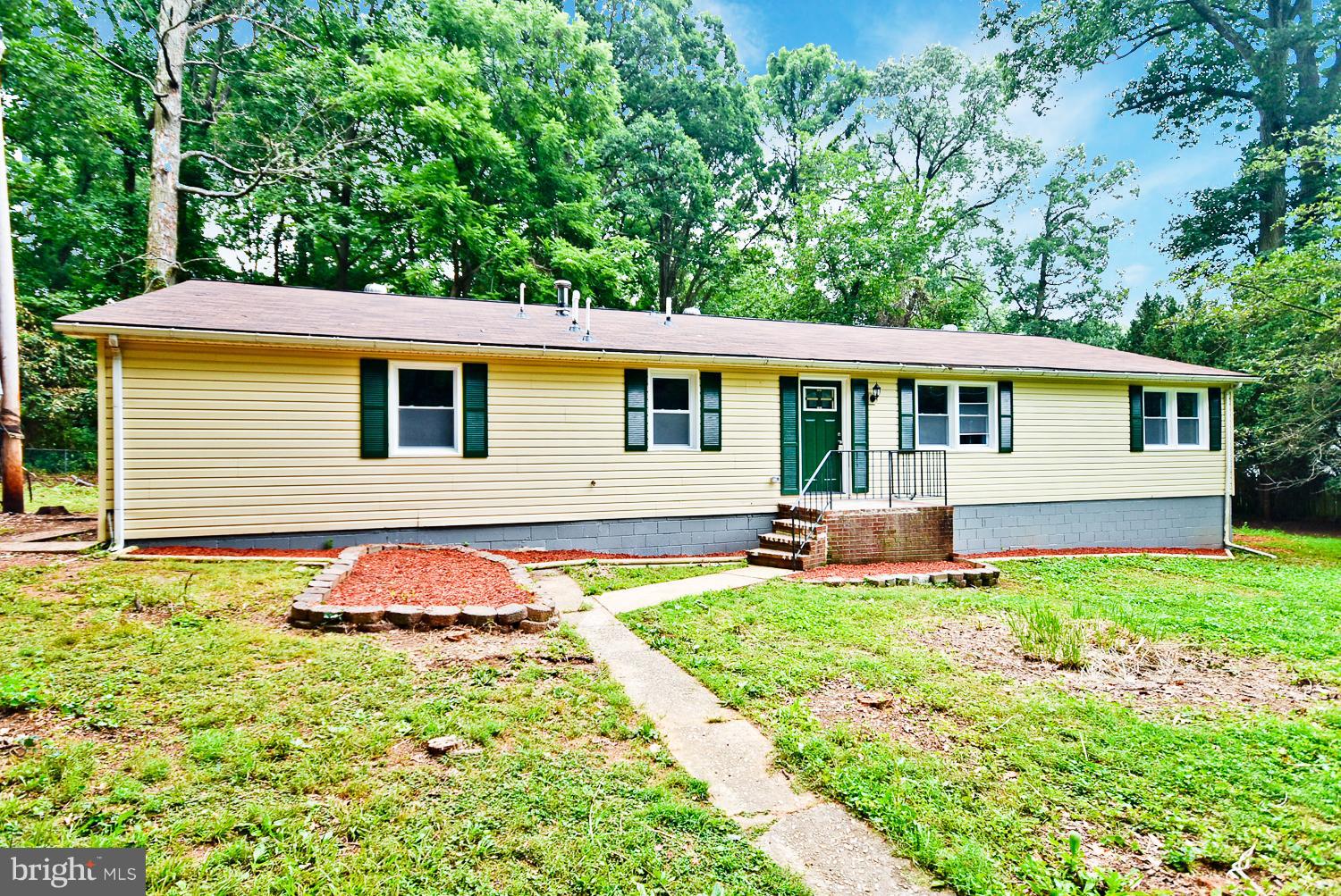 Stunning Renovation! 2lvls, 3BRs,3BAs. Custom kitchen with New Cabinets, Granite, SS SAMSUNG Appliances. Custom HW Floors, Recess lighting, Ceiling Fans, High-end vanities. New windows, New Roof, Doors, Mechanical, Electric, Plumbing & Water Heater. Fully finished LL with Separate entrance, full bath & Laundry room. Spacious backyard W/Off Street parking for 5 Cars., Storage Shed. MUST SEE!!!