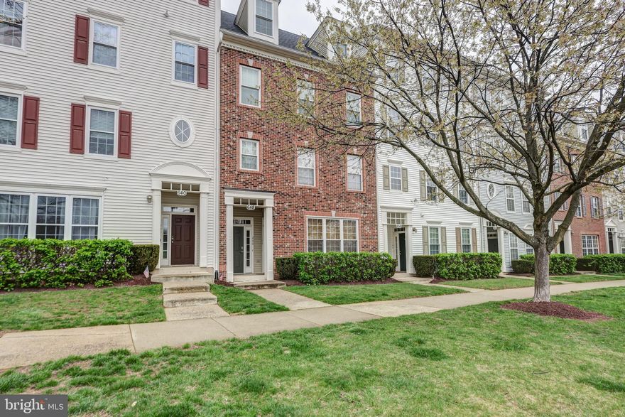 Nestled in the highly sought-after Quince Orchard Park community, this expansive, light-filled townhouse-style condo offers over 2,600 square feet of elegant living space. With a charming brick façade and dormer windows, the exterior exudes classic appeal while remaining virtually maintenance-free.

Ideally situated just steps from the community pool, clubhouse, and gym, this home combines luxury and convenience in one perfect package. Inside, natural light pours through every room, highlighting the fully renovated interior. This turnkey three-bedroom, two and a half-bath home includes an attached one-car garage and is truly move-in ready.

The beautifully updated kitchen features stunning beveled-edge granite countertops, a stainless steel sink, modern appliances, and new flooring. A 5-foot bump-out provides ample space for a kitchen table, bathed in sunlight, or you can step out onto the gorgeous Trex deck.

Elegant crown molding, fresh paint, and upgraded neutral carpeting flow throughout the home. Upstairs, you'll find three generously sized bedrooms, including a luxurious primary suite with soaring cathedral ceilings, a spa-like en-suite bath with dual sinks and mirrors, new flooring, and an oversized walk-in closet. The two additional bedrooms also feature vaulted ceilings, abundant closet space, and ceiling fans in every room.