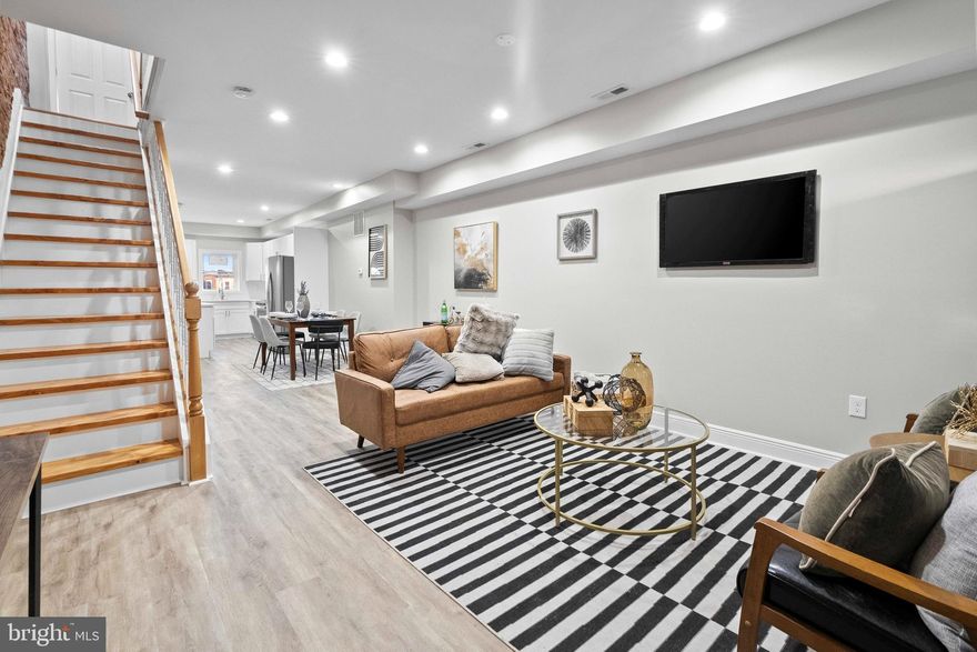 Welcome to 1102 N Kenwood Ave, a beautifully renovated 3-bedroom, 3-bathroom home located in the thriving Biddle Street neighborhood. With modern upgrades, a clean and polished design, and multiple homebuyer grant opportunities available, this move-in-ready home is a perfect option for first-time buyers, professionals, and investors looking for a high-quality property in a revitalizing area.

Step inside to an inviting open-concept layout, where natural light highlights the meticulous craftsmanship and contemporary finishes. The spacious living area flows seamlessly into a modern kitchen featuring sleek cabinetry, quartz countertops, stainless steel appliances, and ample storage—a perfect setup for hosting or everyday living.

Upstairs, you’ll find two well-appointed bedrooms, including a generous primary suite with a stylish ensuite bathroom. A second full bathroom on this level provides comfort and convenience for all occupants. The fully finished lower level adds versatility with an additional bedroom and full bath, making it ideal for guests, a home office, or rental income potential.

Located in Biddle Street, this home qualifies for multiple grant programs that can assist with down payment and closing costs, making homeownership even more accessible. Enjoy the convenience of being near Johns Hopkins Hospital, downtown Baltimore, major commuter routes, and a growing selection of local dining and shopping options.

With its modern updates, thoughtful design, and financial incentives, this home presents an outstanding opportunity for buyers looking to maximize value in a growing neighborhood.