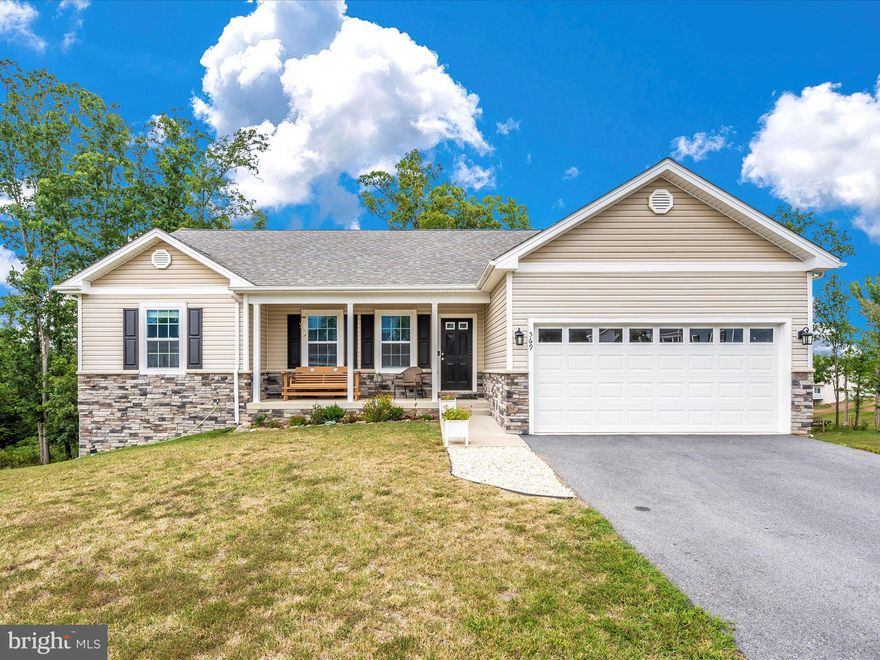 Sellers will be accepting backup offers!!!  Welcome to Your Dream Home! Imagine waking up every morning in this charming single-level residence, where every detail is designed for comfort and convenience. This home features three generously sized bedrooms and two full baths, making it perfect for families or anyone who loves to entertain.

Step into the heart of the home and be greeted by the warm glow of the fireplace in the living room, perfect for cozy evenings with loved ones. The kitchen is a chef's delight with modern stainless steel appliances and luxury vinyl plank flooring that extends into the dining room, great room, and hallway, adding a touch of elegance throughout.

The primary bedroom is a true retreat, complete with a stunning tray ceiling that adds an extra layer of sophistication. Enjoy your morning coffee on the welcoming covered porch at the front of the house, or host gatherings on the spacious deck overlooking your private, tree-lined yard.

The basement is a treasure trove of possibilities with its high ceilings, ample windows for natural light, and a walk-out to the serene backyard. Plus, the owner has some items to complete a bathroom in the basement, offering even more potential for customization.

Storage will never be an issue with a two-car garage equipped with metal shelving. This home is ready to be your sanctuary, combining luxury and practicality in every corner.

Don’t miss out on making this exceptional property your own. Schedule a viewing today and start imagining the wonderful memories you’ll create here!