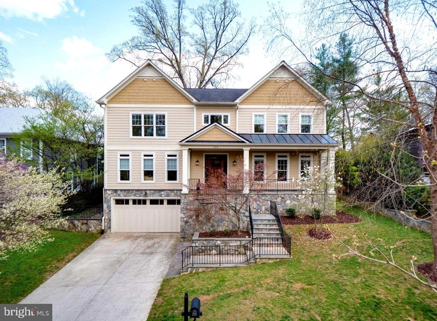 3016 N Oakland Street was built in 2006 for refined living in Bellevue Forest, one of Arlington's favored neighborhoods.    With over 5600 square feet of living space on 3 levels, this floor plan is configured for gracious and formal entertaining as well as unpretentious  relaxation.  The covered  front entry/porch with slate  flooring and rod iron railings creates a polished approach.   A custom solid Oak entry door opens to a generous foyer, 9 foot ceiling height, elegant  2 and 3 piece custom moldings, floor to ceiling windows, many with transoms,  provide an abundance of light in each and every generously proportioned room as well as  custom box beam and coffered ceilings,  gas fireplaces,  glass French doors, hardwood flooring, fresh neutral paint and recessed lighting. These are just a few of the amenities found in this home. The custom-designed Gourmet kitchen will delight...it has it all!  The fabulous center island with prep sink  has a granite top with Ogee edge and is  just the right size for Gourmet cooking and people gathering! The 6 burner (plus griddle) gas stove with pasta filler and vent hood makes cooking fun.  Stainless steel refrigerator, dishwasher and a large walk-in pantry off the butler's pantry (complete with wine captain) complete this modern and sophisticated kitchen area.  There is a large casual dining area in addition to the formal dining room which has paneled-frame molding...so pretty and unexpected. The family room with gas fireplace and custom built-ins is tucked away in the rear of the home overlooking the private yard.  There is flexible work space or a  home office...again tucked away for privacy and quiet.  The upper level is where you will find a lovely owners suite complete with two separate walk -in closets, and a spa bath. The 3 additional secondary bedrooms found on this level are spacious, carpeted and ready for new  dreamers. Venture to the lower level where you will find another super- size bedroom with full bath and an entertainment  room, huge storage  area and access to the two car attached garage.  Bellevue Forest borders Donaldson Run Park and Oakland St is just steps away from the many trails that lead to the Potomac River. Attention to detail is noted throughout this home....come see for yourself.