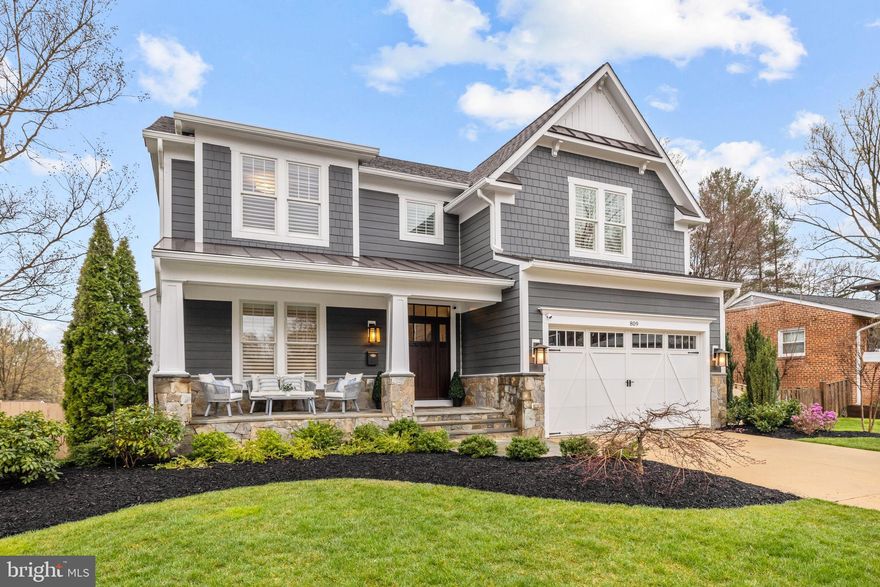 MUST SEE nearly new craftsman by Fisher Custom Homes built in 2014, offering designer finishes, thoughtful updates, and numerous upgrades throughout! This 5-bedroom, 4.5-bathroom home is sited beautifully on a perfectly flat, fully fenced 0.25-acre lot and features a newly built large composite rear deck - just perfect for indoor and outdoor living!

Some recent updates include refinished main level wood floors, kitchen with new quartz countertops and new oversized island, designer lighting from Pottery Barn, Kichler, etc. throughout, all new wood floors in secondary bedrooms, new LVP in lower level, new irrigation system installed, premium landscaping, new upper-level HVAC system with uv filter, whole house paint, plantation shutters, and so much more. 

The MAIN LEVEL features a stunning white kitchen with white quartz countertops, touchless faucet, undercabinet lighting; breakfast room with walls of windows and sliding glass doors to the rear deck and also open to the family room with a gas fireplace and built-ins. Also on the main level is the formal dining room with glass French pocket doors with a butler's pantry and new wine fridge, and office, also with glass French pocket doors, and built-in cabinetry, along with the formal powder room, mudroom with built-ins and shelving, and exterior door to the side yard, which features a fenced-in dog run. 

The UPPER LEVEL has newly installed wood floorings in all of the secondary bedrooms, plantation shutters, and recessed lighting throughout. The primary suite is filled with incredible natural light, two walk in closets with built-ins, a gracious bathroom with marble tile and marble countertops. There are also three secondary bedrooms on the upper level, one featuring an en-suite bathroom and the other bedrooms share the third full bathroom.  The laundry room is conveniently located on the upper level and features a new washer and dryer, along with extensive cabinetry, stone countertops, and a sink. 

The LOWER LEVEL features incredible natural light through its walls of windows, plus glass doors that lead to walk up steps, newly installed LVP flooring, recessed lighting, and an expansive rec room with plenty of flex space for gaming, entertainment, etc, along with a wet bar that features honed granite countertops and pendant lights. Bedroom 5 and full bathroom, along with a storage room, mechanical room with storage space, and bonus closet complete this level of the home.

809 Meadow Lane SW is ideally located just minutes to Vienna's sought-after Maple and Church Avenues, shopping at Tysons and Fairfax, outdoor recreation just steps to Nottoway Park, Meadow Lane Park, and offers easy commuting with its incredible proximity to I-66, I-495, and the Vienna/GMU Metro Station.  This exceptional home truly has it all!