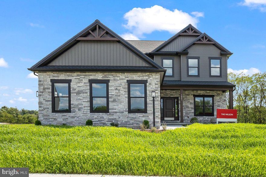 Introducing The Wilson, the latest plan crafted by our award-winning team. . Step inside this thoughtfully designed home, boasting 2576 sq. ft. of living space adorned with 9-foot ceilings on both the first and second floors. A gourmet kitchen featuring a gas stove, granite counters, an island, a pantry, and a seamless connection to the breakfast and family room. Additional highlights of the first floor include a separate living and dining room, a mudroom, a welcoming foyer, a convenient half bathroom, and luxury vinyl plank flooring throughout. The side entry three-car garage adds both convenience and functionality. Second floor, where you'll discover four bedrooms, two full bathrooms, and a dedicated second-floor laundry room. The Owner's Suite is a sanctuary, featuring a luxurious bathroom with a spacious walk-in shower, a large walk-in closet, and an elegant tray ceiling. Don't miss the opportunity to experience the exceptional design and quality of The Wilson. Schedule your tour today and envision the lifestyle that awaits you in this remarkable community.