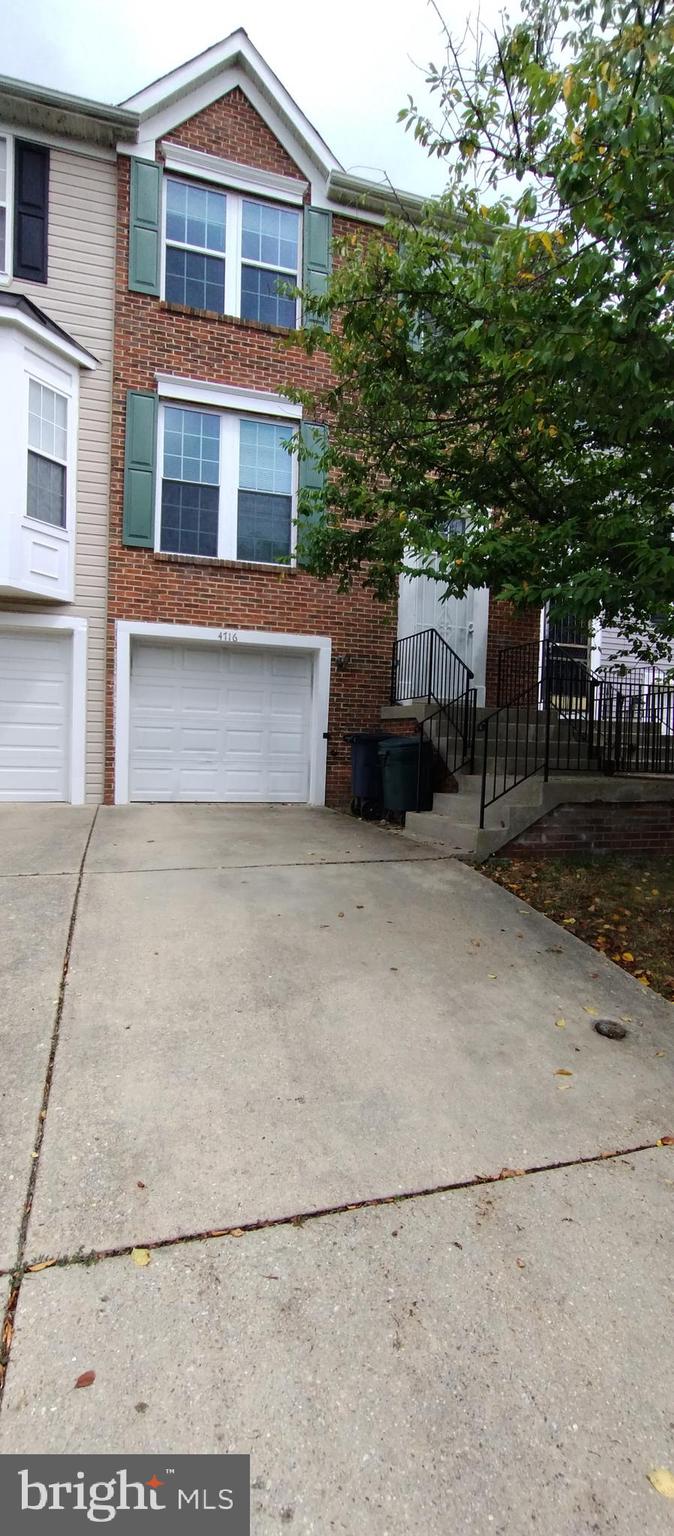 3BR/2BA/2HB townhome with attached garage located in the Rollingdale community. Property includes a finished basement, open main-level floor plan, and an eat-in kitchen equipped with a new refrigerator, new dishwasher, and new electric range. Conveniently situated near public transportation, schools, and shopping. Home is move-in ready with standard finishes throughout. Rental application is available upon request from the listing agent.