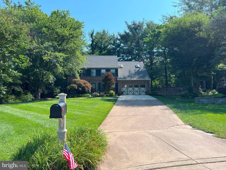 NOTE:  OPEN HOUSE 7/27/25 CANCELLED.  Gorgeous home on largest lot in the neighborhood looks like new.   ENTIRE HOUSE FRESHLY PAINTED;  NEW ROOF in 2024;  NEW CARPETS! Most appliances new or lightly used.  4 bedrooms and 3 baths upstairs;  primary bedroom with two full baths, cathedral ceiling, skylights, walk-in closets, and fireplace.  Main floor consists of large kitchen;  new down-draft stovetop;  double ovens;  island;  pantry; laundry room; granite countertops; bay window; eat-in area with new Tiffany lamp; family room and wood-burniing fireplace;  EXIT TO LARGE WRAP-AROUND DECK AND PATIO.  Separate dining room with antique chandelier;  living room;  all hardwood floors;  half bath; den/office.  Lower level au-pair/tenant/guest suite with kitchen (Emeril air fryer oven/toaster); spare room; full bath; laundry; dining/family room; walk-out to yard with patio.  Lots of storage in lower level and in two-car garage.  All exisiting window treatments and televisions convey. $200 is family rate for access to all Reston Association recreational facilities.