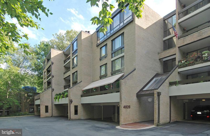 Beautiful corner unit w/ 3 exposures in private & secluded location in Sumner Village.  Fully renovated kitchen and bathrooms and freshly painted interior. Gracious entry, large living room with fireplace and glass doors that open to expansive, level terrace and gardens, dining room, table space kitchen,  2 spacious bedrooms, plus den (could be 3rd bedroom), two full and 1 half bathrooms.  Primary bedroom opens to oversized balcony. Two garage spaces and a large storage room convey. Enjoy extensive community amenities, including 24-hour gated entry, outdoor pool, tennis and pickleball courts, fitness and party rooms, a library, and a sauna. Ideally located next to the Shops of Sumner and near the new  Westbard Square. One block to Metro Bus, minutes to major roadways and DC, and direct access to The Capitol Crescent Trail.  Open Sunday, 5/18, 1pm-3pm.