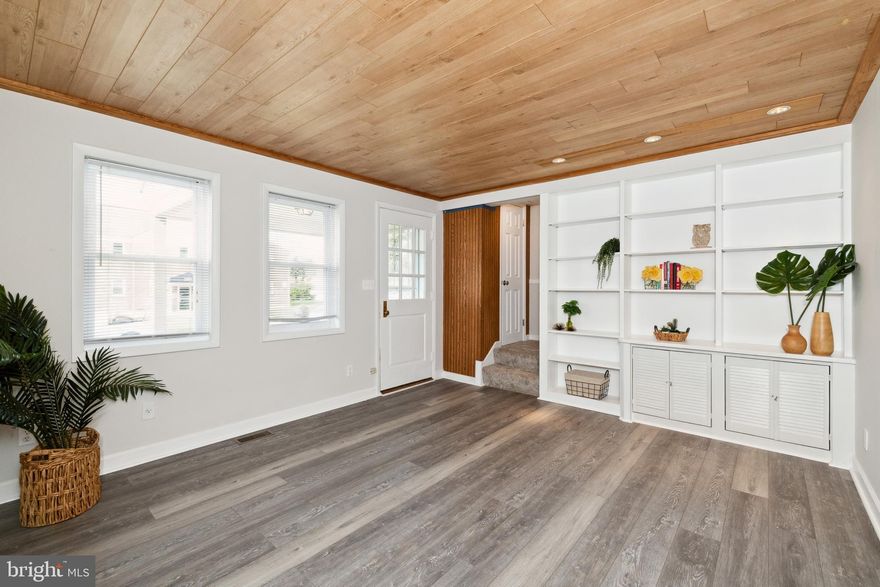 Welcome home to Loch Raven! This home has everything you need and is ready for move-in. Enter from the adorable front porch into the light filled family room with updated flooring and built ins!  Continue into the spacious eat-in kitchen with a beautiful large window. The peninsula has additional storage along with space to add a barstool or two. Pass by a coat closet on the way upstairs where you'll find three bedrooms and a full bathroom. The lower level is partially finished with space for a second living area! A half bathroom is on the lower level as well as laundry with a utility sink. The fully fenced backyard is a wonderful space to spend cool fall weekends! Enjoy dining al fresco on the porch and there's plenty of room to start your own garden. Schedule a showing today so you can call this home your own by the holidays! Updates include: water heater (2018), exterior sanitary line from house to city main replaced (2014), chimney liner (2018), windows (2022), attic insulation (2018), central air/HVAC (2022). Also, the first and second floor external walls are insulated which is not standard! Finally, there is new carpet, flooring, and fresh paint throughout.