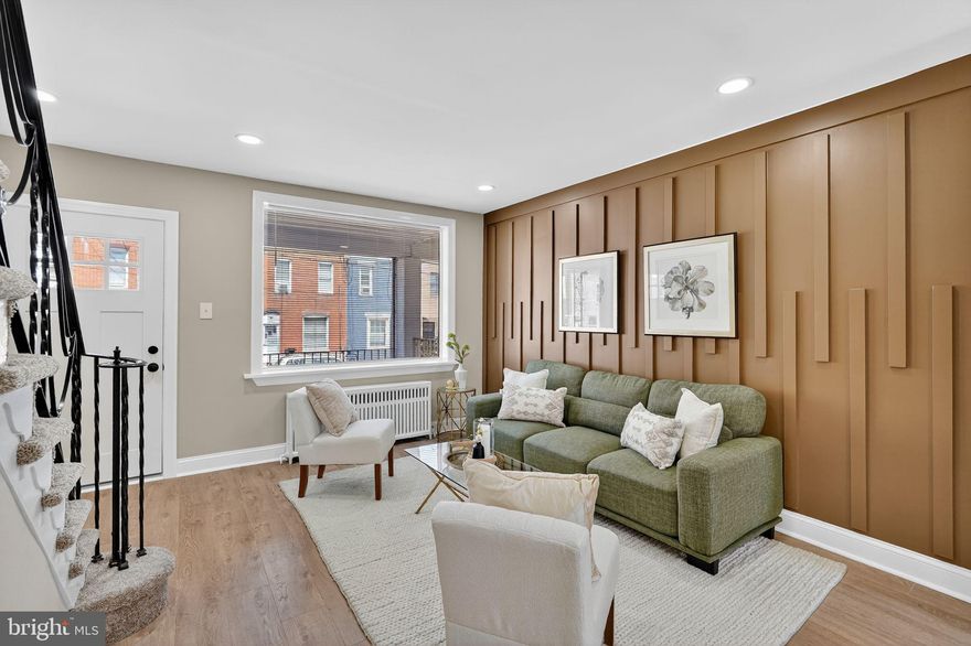 Welcome to 2993 Gaul Street, a beautifully renovated home in the heart of Philadelphia. The main level boasts stunning laminate wood flooring that flows seamlessly through the spacious living room, dining area, and modern kitchen. The kitchen is a chef’s dream, featuring brand new white shaker cabinets, sleek stainless steel appliances, granite countertops, a ceramic tile backsplash, and stylish new hardware. Upstairs, you’ll find three comfortable bedrooms, each with brand new wall-to-wall carpeting. The full bathroom on this level has been completely updated with ceramic tile flooring, a new vanity, tub, shower, and toilet. The partially finished basement, complete with laminate wood flooring, offers additional living space perfect for a home office, playroom, or gym. This move-in ready home combines modern finishes with functional design—schedule your tour today!