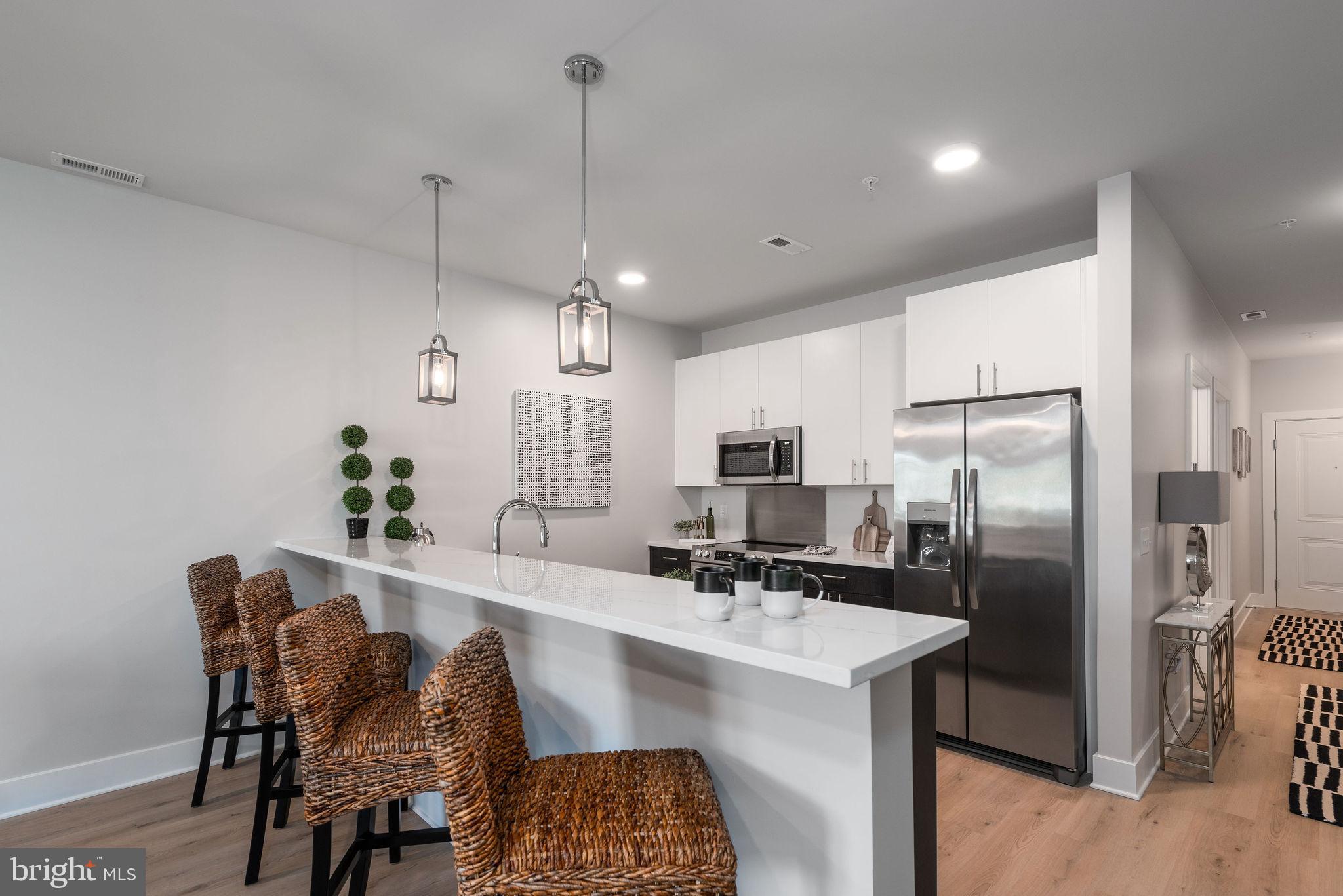 FLATS AT COASTAL STATION - Residential