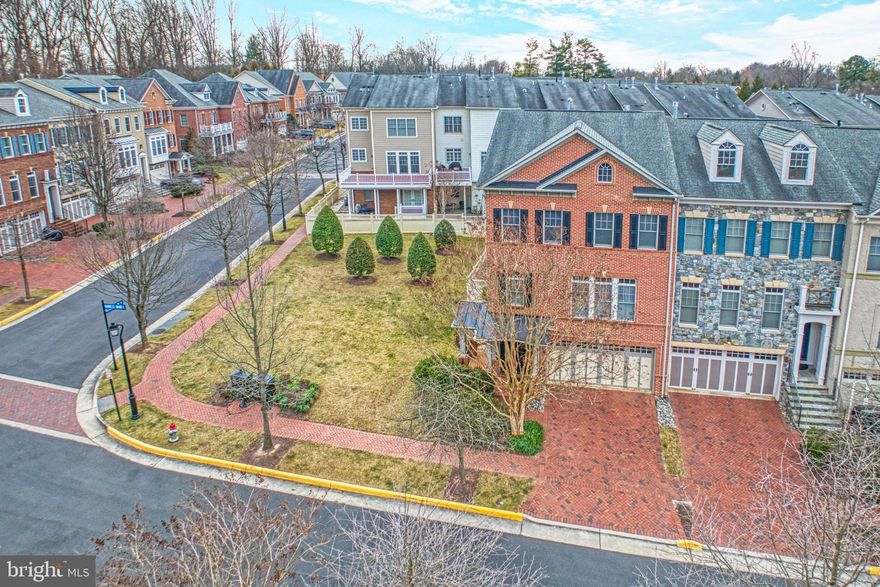 Dazzling on Darrells Grant. Sensational in Stockwell Manor!
End Townhome adjoining Prime Lushly Landscaped Common Area
A Home like no other....with every Upgrade Imaginable!
Impeccable Features including Custom Brick Patio and Primary Bedroom Deck  
Three Levels of Luxury Living with Hardwood Floors & Custom Plantation Shutters Throughout
Three Level Bump Out on Rear for Maximum Square Footage and Light Filled Rooms
Beautiful Furniture Grade Cabinetry in Kitchen 
Natural Stone Countertops in Kitchen 
Custom Built-in Cabinetry in Upper Level Hall and Lower Level Family Room
Upper Level Laundry Room Upgraded to include Cabinets and Sink
Upgraded Primary Bedroom Closet
Upgraded Tile Throughout
Full Bath in Lower Level 
Professional Landscaping in Front, Side and Rear at Custom Brick Patio