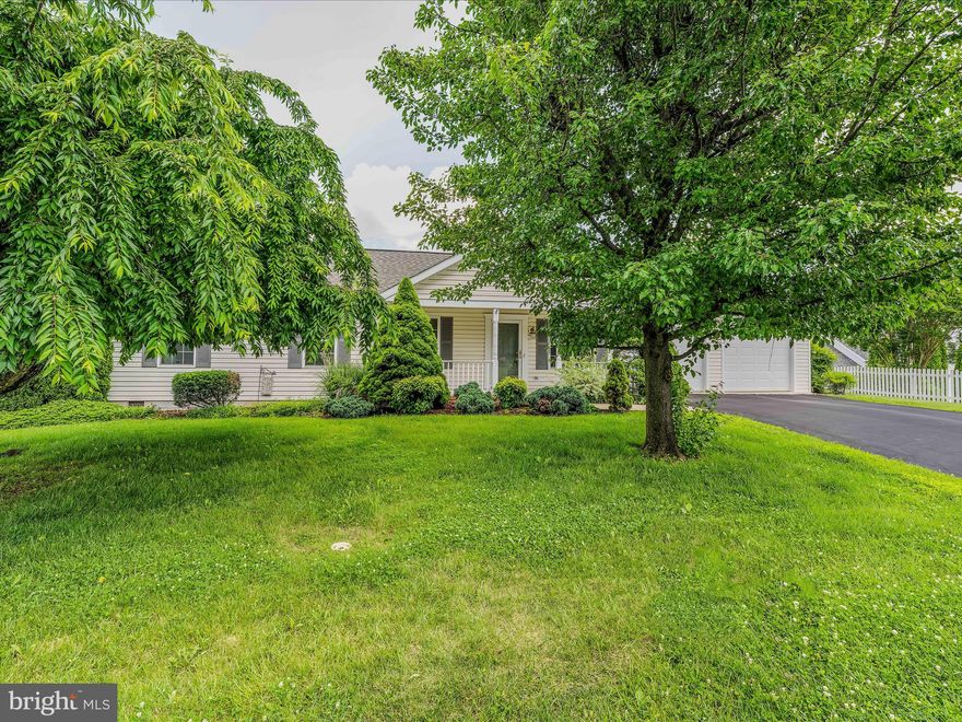 FULLY handicap accessible! 
Charming 2-Bedroom/ 1 oversized bath rancher.
Welcome to 101 Sentry Lane, a delightful rancher in the sought after established Dry Run Commons neighborhood. This charming property is now available for sale and offers easy one level living with 2 bedrooms and 1 bathroom. The charming front porch is perfect for a swing or rockers.  The  home was built to be fully handicap accessible with no steps. Gleaming hardwood floors in main living areas and plush carpet in the bedrooms. The living room features cathedral ceiling. Kitchen is open to large dining area. Master bedroom is  oversized with a large walk in closet. The bathroom is complete with separate tub and an oversized fully handicap walk in shower. The concrete patio is just off the dining area and the vinyl white privacy fence encases the back yard. The oversized spacious two-car garage, ensuring ample room for your vehicles and additional storage. Situated just minutes away from shopping, dining, parks, hospital and I-81. Enjoy the ease of nearby amenities. Don't miss the opportunity to make this wonderful house your new home!