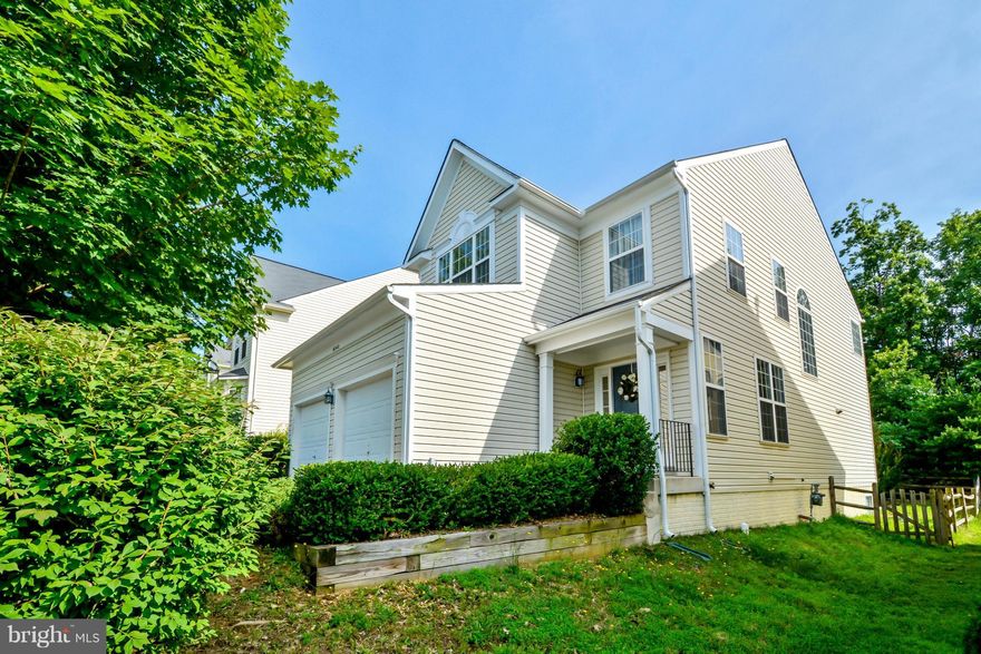 This is a gorgeous colonial conveniently located near commuting, Quantico, 95, VRE Commuter lot, Shops and schools.  There are beautiful Hardwood floors on the main level and freshly painted.  Relax in your 2 person soaking tub in the updated master bath.  Beautiful vaulted ceiling in the master bedroom.  Your rear yard backing trees will make it more relaxing when entertaining on the stone patio.