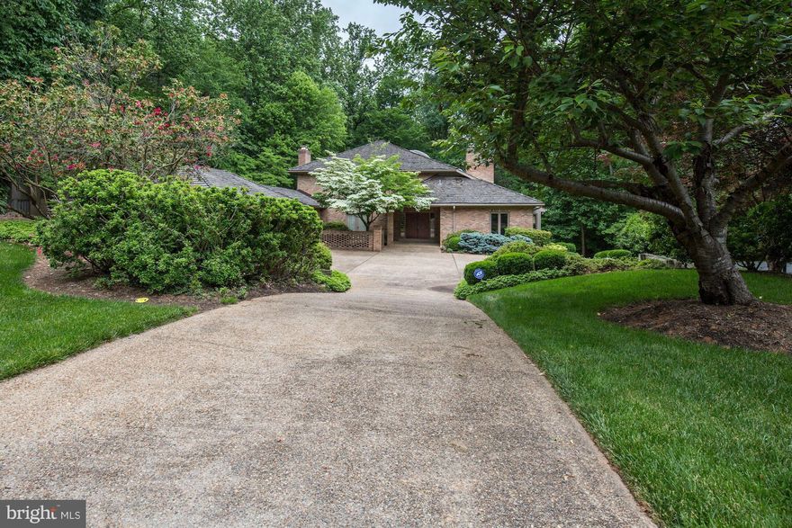 Extraordinary and spacious home w/large rms on gorgeous private acre lot. Large entry foyer. Spacious kit w/fireplace & huge center-island. Library with a wall of bookshelves. Screened porch.  Enormous master bedrm, w/lots of closets plus  his & her bathrooms. Fin W/O LL w/huge rec rm plus 2 other rooms & 2 storage rooms. 3 car garage. Convenient to 495, Dulles & Tysons. Pets allowed w/conditions.