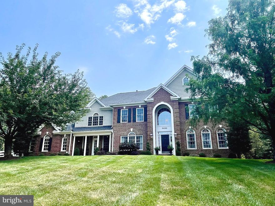 Welcome to this stunning over 6,000 sq ft brick-front estate, nestled in the highly sought-after Loudoun County — a picturesque countryside oasis known for its excellent public school system, breathtaking mountain views, and rich historical charm. Situated on 2.94 serene acres, this property offers the rare combination of luxury, space, privacy, and scenic beauty.

Featuring 5 bedrooms and 4.5 bathrooms across three finished levels, this home blends timeless elegance with modern upgrades. The custom chef’s kitchen, beautifully remodeled in 2017, is the heart of the home — boasting a striking center marble island, sleek leathered granite countertops, a Sub-Zero refrigerator, Wolf steam oven, and a top-of-the-line dual fuel range with griddle and double ovens — a true culinary dream.

Thoughtfully designed for comfort and efficiency, the home includes a geothermal heating and cooling system with propane backup, ensuring year-round energy savings. The upper-level features brand-new carpeting, including a spacious primary suite with two walk-in closets and a beautifully renovated spa-style bath.

The main level showcases gleaming hardwood floors, a bright family room with a gas fireplace, and dedicated office space. The fully finished basement includes a large rec room, full bath, wet bar, game room, and an added bedroom — ideal for entertaining or multigenerational living.

Step outside and take in the stunning mountain views and peaceful, tree-lined backyard with stone patios — perfect for relaxing or hosting gatherings. A 3-car garage and thoughtful upgrades throughout complete this exceptional offering.

Located just 30 miles west of Washington, D.C., this home offers easy access to the nation’s capital while enjoying the tranquility and character of Loudoun County. Residents benefit from proximity to charming historic towns, rolling hills, and a blend of suburban and rural living — all supported by top-tier public services and schools.

This is a must-see for those seeking comfort, space, style, and the unmatched lifestyle that Loudoun County has to offer.