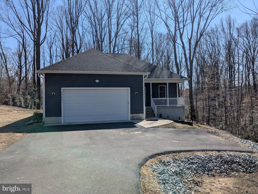 Charming & Private 2.5-Year-Old Home – Ready for You!!
Nestled in a peaceful, private setting, this barely 2.5-year-old home is the perfect retreat! Step inside to find beautiful vinyl plank flooring, plush carpeted bedrooms, and a modern kitchen featuring soft-close cabinetry, gleaming granite countertops, and stainless steel appliances. The primary suite boasts dual sinks for added convenience.  All bedrooms feature quiet ceiling fans.
Enjoy relaxing or grilling on the spacious deck overlooking serene woods. The oversized garage and long paved driveway offer ample parking and storage space.
Beyond the home, take advantage of fantastic community perks, including water access, beaches, and a boat ramp. Conveniently located near top-rated schools, restaurants, and shopping, this rental won’t last long! Schedule your showing today!  Rental Requirements include
No recent late payments, collections, bankruptcies, foreclosures, or evictions
Responsible debt-to-income ratio
Application Details:  All applicants over 21 must submit an application ($50 non-refundable fee).
Don't miss out on this incredible home—make it yours today!  call John for showing.