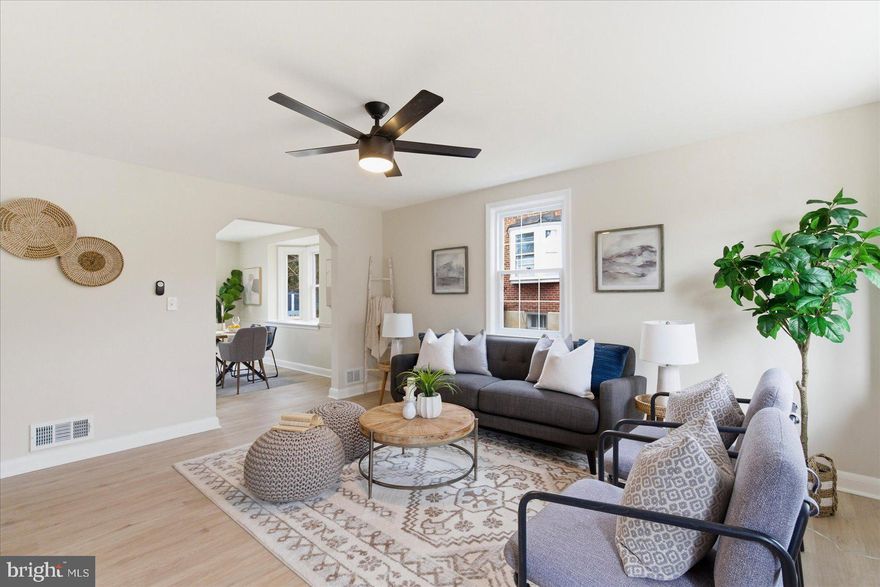 Beautifully renovated 4-bedroom, 2 full bath end-of-group rowhome in desirable North Bend! This light-filled home features an abundance of natural sunlight, highlighted by two stunning bay windows — one in the living room and one in the dining room — creating bright and welcoming spaces throughout.

The updated kitchen is designed for both style and functionality, offering quartz countertops, a spacious island, stainless steel appliances, and gas cooking. Step right out to the deck off the kitchen — perfect for entertaining or enjoying outdoor dining.

Upstairs, you’ll find three comfortable bedrooms with plush carpeting and a fully renovated bath featuring modern finishes.

The finished lower level provides a versatile fourth bedroom along with additional finished space ideal for a home gym, office, or recreation area.

Relax on the charming front porch — the perfect spot for morning coffee or evening cocktails. With thoughtful updates, generous living space, and incredible natural light, this home is truly move-in ready!