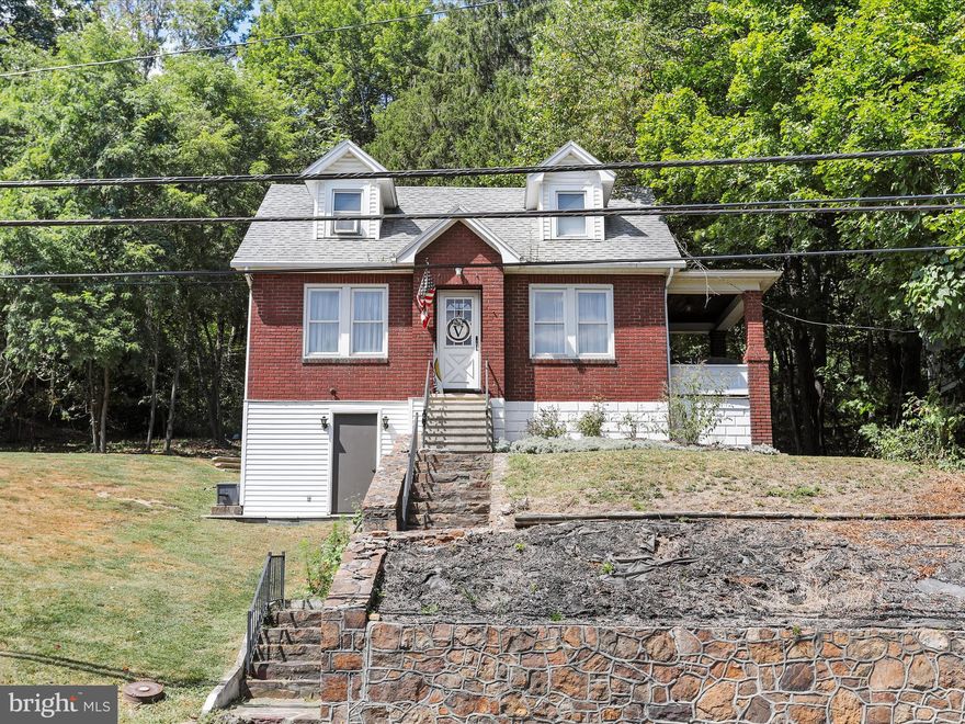ADORABLE MOVE-IN READY CAPE COD RIGHT OUTSIDE CITY LIMITS! Welcome to 11903 McMullen Highway. This 2 bedroom, 1.5 bathroom home has been lovingly renovated, maintained and is ready for its new owner! The main level features a spacious living room with a decorative fireplace, a formal dining room, a recently renovated kitchen, a covered side porch AND a screened-in back porch and patio area for additional indoor/outdoor living space. Upstairs, there are two bedrooms and a renovated bathroom with a tub/shower. The basement is unfinished, with the exception of a bathroom, and features space for laundry and storage. Outside, the home sits on a 0.58 acre lot that backs to woods and has a small stream to the right of the home. There is plenty of off-street parking and a storage shed. Conveniently located to I-68 and the City of Cumberland BUT NO CITY TAXES! Call today- this cutie will not last long!