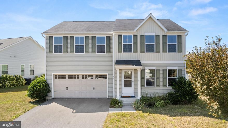 Welcome to this charming home in a quiet neighborhood. The first floor features a desirable open-concept layout where the large family room seamlessly flows into the kitchen and dining area—perfect for daily life and entertaining. Adjacent to the living space, you'll find a convenient powder room, a large coat closet, and a versatile flex room, ideal for a home office, hobby space, or playroom. Upstairs, four spacious bedrooms await. The luxurious primary suite boasts a huge walk-in closet and a private en-suite bathroom, while three additional bedrooms also feature large closet space. An oversized laundry room adds a practical touch to the upper level. The unfinished basement provides ample storage. Outside, enjoy your large, flat backyard with a paver patio, perfect for morning coffee or evening gatherings. With shopping and major highways conveniently close, this move-in-ready home won't last long!