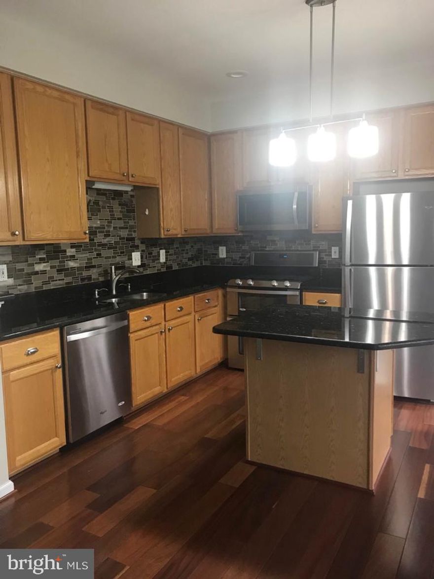 BEAUTIFUL TOWNHOUSE WITH 3 LVL EXTENSION. VAULTED CEILINGS IN BEDROOMS. LUXURY MASTER SUITE WITH WALK IN CLOSET AND LUXURY BATH. KITCHEN WITH LARGE BUMP OUT.  SPACIOUS LIVING ROOM.. LARGE GROUND LEVEL REC ROOM. FENCED BACKYARD. CLOSE TO METRO, DULLES AIRPORT & TOLL ROAD, ROUTE 28, 7, SHOPPING & RESTAURANT. MOVE-IN READY. PLEASE SCHEDULE ONLINE.AVAILABLE JULY1st