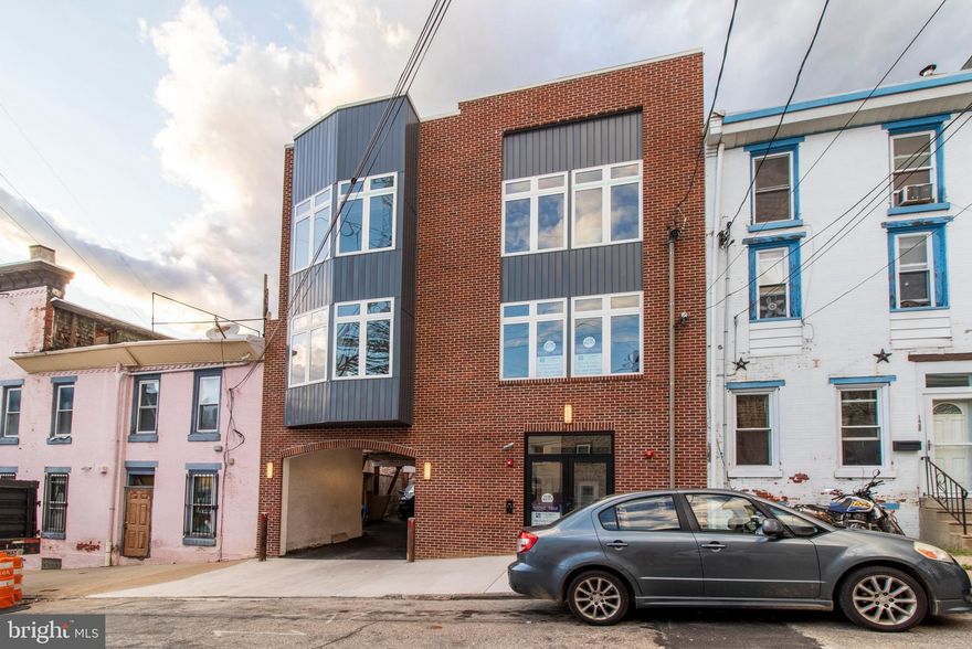 Available for May 1 move in - Fabulous boutique 4 unit custom building! Fantastic 2 BR/2 BA residence in prime location in the heart of downtown Manayunk.  This light-filled apartment features open-concept living space including Eat-in kitchen, stainless steel appliances, contemporary quartz counter tops and white shaker cabinets. Laundry room complete with washer and dryer included in each unit.  Large windows with great views. Shared roof top deck great for entertaining.  Energy efficient, maintenance-free living.  Off-street covered parking plus bike racks and small private dog park.  You may not even need a car considering it's just a short 1 block walk to the train and a couple blocks to the shops, restaurants, cafes, gyms along Main Street.  Easy access to Center City, the suburbs and major highways.