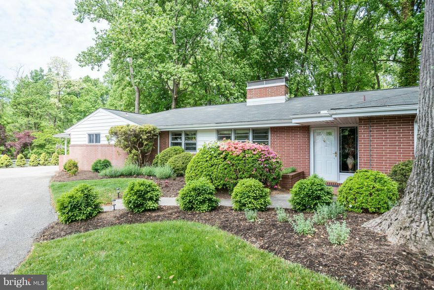 With soaring ceilings and spectacular natural light, this impeccably maintained 3 Bedroom 2.5 Bath Stevenson rancher boasts a graciously-sized Family Rm addition w/ cathedral ceilings plus a main level Den. Situated on a lushly landscaped, park-like lot of nearly 1-acre, this home features a private brick paver patio & gorgeous green space with irrigation system.  NEW ROOF in 2015! 2 Car Carport