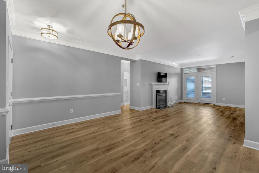 You will fall in love with this beautifully appointed home in the sought-after, active adult community of Heritage Hunt!  As you enter you'll see extensive new flooring and fresh Benjamin Moore paint throughout the home.  The crowning jewel is the newly remodeled kitchen offering stunning Calcutta Bella Quartz with matching trim, except for the refrigerator, all new appliances to include a drawer-microwave making removing hot items much safer, custom-built cabinets, glass doors, a new double oven range, multiple lighting features/settings and a huge apron sink: this is a true must see!  Both the flooring and the kitchen have transferable warranties.  Other features of this move-in ready home are plantation shutters on all windows and doors, upgraded crown molding in main living areas, new carpet in both bedrooms, exposed walls are brick, and a private storage room on the garage level.  Condo living allows you more time to enjoy the country club lifestyle! This gated community offers over 750 beautifully landscaped acres, 2 well-appointed clubhouses, a quality restaurant and bar, indoor and outdoor pools, tennis, pickleball and bocce courts, miles of walking paths, over a 100 clubs and social events to enjoy.  Golf course memberships are available. The main clubhouse and restaurant is an easy walk from the home.  This community is close to many restaurants and shopping, major commuting routes and a few miles to the new UVA Haymarket Health Center which includes a hospital and many medical professionals.  See you soon!