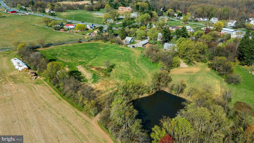 CUSTOM HOME SITES -- WORKING FARM -- EQUINE FACILITY -- TONS OF POTENTIAL! Discover the potential of this expansive 179.25-acre property nestled in the heart of Mt. Airy, Maryland. With a balance of natural beauty, agricultural functionality, and future potential development opportunity, this property may work for farmers, developers, or those seeking a peaceful rural lifestyle. Property Features: Tillable Land: Approximately 80 acres of productive, tillable farmland—perfect for crops, grazing, or equestrian use.  Residential Home: A charming farmhouse provides comfortable living with scenic views and privacy.  Home is in need of improvements but is currently habitable. Outbuildings & Infrastructure: Three barns and outbuildings offer ample storage, workshop space, or livestock shelter. Water Features: Two ponds enhance the landscape, providing natural irrigation and recreational possibilities. Development Potential: Four (4) Unrestricted 1-acre building lots—ideal for custom homes, guest cottages, or future sale. Three (3) tenant house building rights—expand housing for farm workers, renters, or extended family. This unique offering blends open land, water features, and development rights in a highly desirable location with convenient access to commuter routes and nearby amenities. All information provided and all ideas about future potential uses must be verified by buyer and approved by Howard County Planning & Zoning. Copy of existing easements are available for qualified purchasers to review. All purchasers will be required to show proof of funds prior to scheduling a tour of the property.