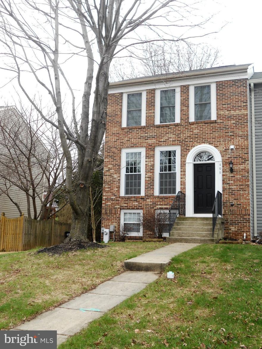 Gorgeous brick front updated end unit townhouse.Updates include kitchen cabinets-granite-SS appliances-some new windows-ceramic floors-carpet-hardwood floors-slider to deck-butcher block cabinet in kitchen-deck-,back splash in kitchen-crown molding throughout-front door-pantry shelving.-doors-baths and shed. Lg fenced backyard.This home is immaculate and shows like a model.