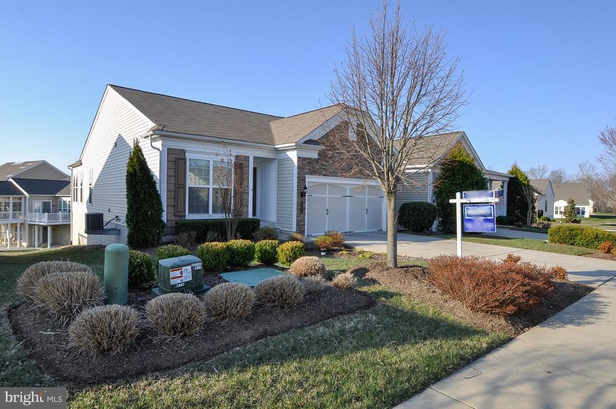 Move in Ready! Better than buying new! Popular "Madison" model in Del Webb 55plus community of Celebrate VA! Shows beautifully with over 2600 square feet finished*Stainless steel and granite in kitchen*Low maintenance deck*Walkout finished basement with large storage area/bedroom/bath and family room*Walk to community amenities including award winning clubhouse with indoor/outdoor pools