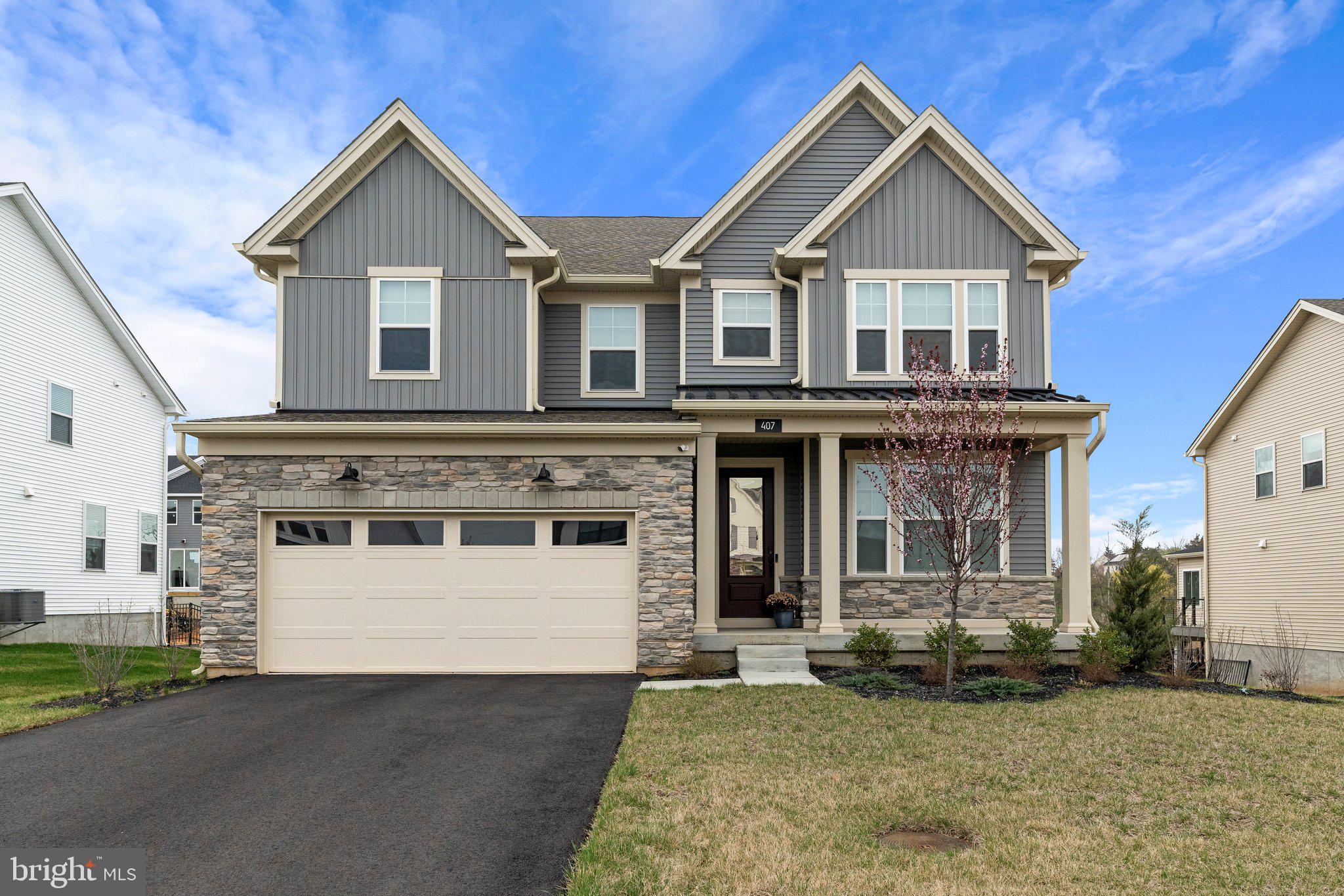 Welcome to this stunning Toll Brothers Pickering model with the Huntingdon exterior, built in 2023 and meticulously maintained in immaculate condition. This exceptional 5-bedroom, 5.5-bathroom residence offers an elevated lifestyle with thoughtfully curated upgrades, sophisticated finishes, custom treatments, and an open-concept design ideal for modern living and entertaining.
The heart of the home is the gourmet kitchen, beautifully appointed with high-end cabinetry, premium countertops, and designer fixtures. Flowing seamlessly into the sun-drenched dining area and expansive great room, the layout invites effortless entertaining and everyday comfort. Step out onto the deck off the kitchen—perfect for morning coffee or hosting under the stars.
Upstairs, the loft area offers additional flexible living space, while four spacious bedrooms, including a luxurious owner’s suite, provide comfort and privacy. The en-suite primary bath offers a spa-like experience with dual upgraded vanities/finishes, an expanded luxe shower with built-in seat, custom tilework, and a spacious linen closet for optimal storage. A convenient upper-level laundry room adds to the home’s functionality.
The finished basement is a showstopper, featuring another full bathroom, custom millwork and wallpaper, a cozy fireplace inset, built-in bar area, and additional open space—ready for entertaining or easily customizable to suit the buyer’s lifestyle needs. Outside, enjoy beautifully maintained grounds and a generous outdoor space, ideal for gatherings or quiet retreats.
Location is everything, and this home delivers—just minutes from the King of Prussia Mall, the vibrant Town Center, Valley Forge Park, LA Fitness, Lifetime Gym, and premier shopping, dining, and entertainment. Enjoy easy access to major highways and a short drive to the Manayunk area in Philadelphia. Commuters will appreciate proximity to major employers such as Lockheed Martin, Merck, AmeriGas, Universal Health Services, and more. This is luxury living at its finest—refined, convenient, and move-in ready.