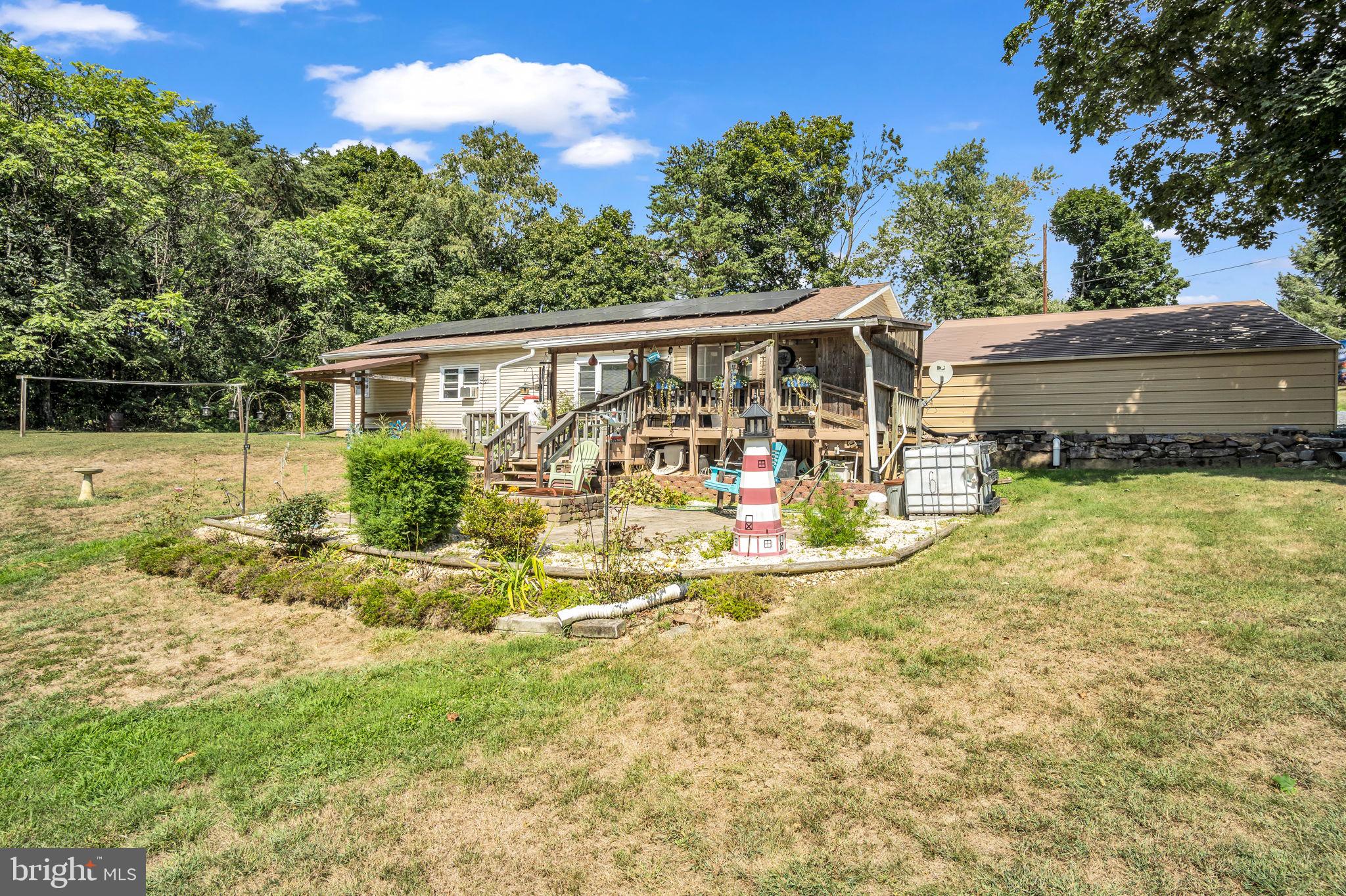 If you’ve been searching for a one-level home with room to spread out, this property offers plenty of potential! Nestled on just over three acres, this ranch-style home features three bedrooms plus a possible fourth, two full bathrooms, and spacious living areas that are ready for your personal touch.
The main living spaces provide a comfortable layout, with a bright living room and an open feel that’s perfect for everyday living. The kitchen offers plenty of functionality and the opportunity to make it your own. Outside, you’ll love the peaceful surroundings and wide-open space — ideal for enjoying nature, gardening, or simply relaxing. Home also includes solar panels to help offset electrical cost for heating and day to day function.
This well-loved home is ready for it new owner. Whether you’re looking for a little more land, a home you can make your own, or a quiet setting to call your own, this property is worth a look!