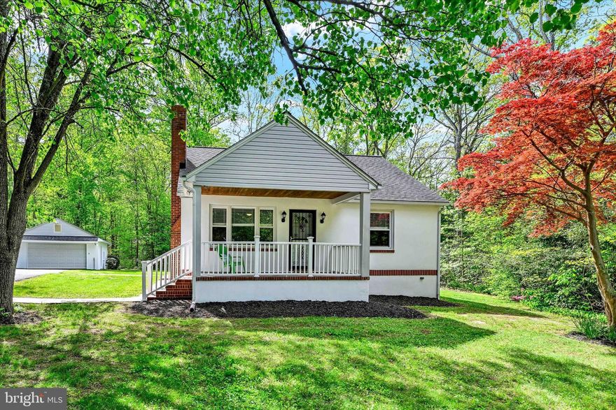 **Professional photos to be uploaded on Thursday morning**   Quaint Cape Cod with covered front porch on 2.34 Private Acres – An Outdoorsman's Dream! Tucked away on a serene 2.34-acre lot that backs to mature woods, this charming 3-bedroom, 2-bath Cape Cod offers the perfect blend of cozy character, modern updates, and unmatched privacy. Whether you're seeking peace and quiet or space to create your dream outdoor lifestyle, this property delivers. The heart of the home is a beautifully upgraded kitchen featuring  Corian countertops, brand-new 42" cabinets, and sleek stainless steel appliances. The finished basement offers versatile space with a full bath, a kitchen area, 2 additional rooms with the functionality of a bedroom(s) and/or office. This lower level has the potential of being an in-law suite or home office setup, perfect for a home-based business.

The main level bathroom has been tastefully updated, including a beautifully tiled walk-in shower, pebble tile flooring, and a glass enclosure. Although this home has that country feel and sits on a generously sized lot, it features the conveniences of  public water and sewer.

Step outside to your own private retreat: a spacious deck tucked behind the detached 1.5-car garage, a He/She-shed with electricity, and a beautifully maintained backyard backing to trees. With ample room for a pool, tennis court, or pickleball setup, this property is a rare find for those who love outdoor living.

Don't miss this unique opportunity to own a truly special home that combines charm, functionality, and room to grow—this home is in pristine condition and ready for you to make it your new home! Schedule your private tour today!