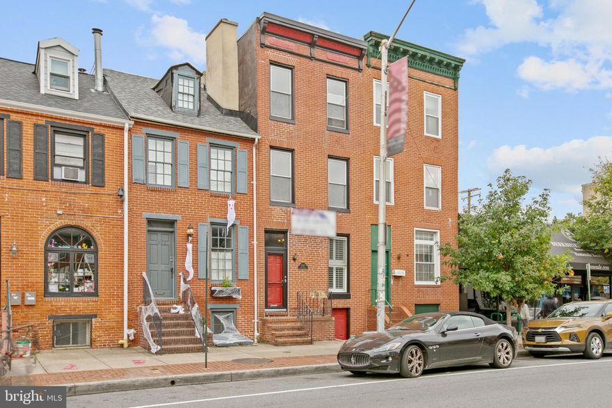 3 STORY FEDERAL HILL ROW HOME WITH PARKING!  ALL NEW CARPET ON UPPER LEVELS.  BRAND NEW FULL BATHROOM IN OWNERS SUITE ON 3RD FLOOR.   OPEN FLOOR PLAN ON MAIN LEVEL WITH HARDWOOD FLOORS, EXPOSED BRICK, LARGE POWDER ROOM INCLUDING FULL SIZE WASHER AND DRYER, GRANITE COUNTERTOPS & STAINLESS  STEEL APPLIANCES!   THE SECOND FLOOR FEATURES 2 LARGE BEDROOMS  + OFFICE NOOK AND UPDATED FULL BATHROOM IN THE HALLWAY.  REAR BEDROOM HAS PRIVATE PATIO. THE ENTIRE 3RD FLOOR IS THE OWNERS SUITE!  TONS OF SQUARE FOOTAGE WITH PARKING IN A+ FEDERAL HILL LOCATION.