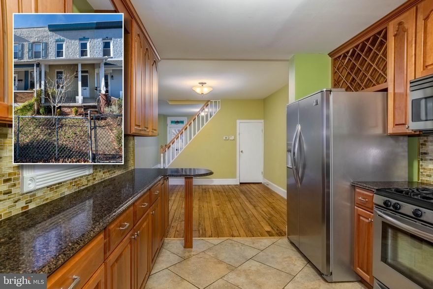 MOVE IN READY PORCH FRONT ROWHOME THAT'S FULL OF CHARACTER AND CHARM!  Located in the heart of Hampden, this rowhome features a spacious living room and separate dining room w/ original heart of pine hardwood floors, updated kitchen w/ ss appliances & custom made solid cherry cabinets, main level half bath & mud room, upper level w/ 2 bedrooms and 1 full bath, a full basement for storage and rear yard with a gated parking pad!  Perfectly located blocks from The Avenue in Hampden and convenient to Johns Hopkins University and I-83!