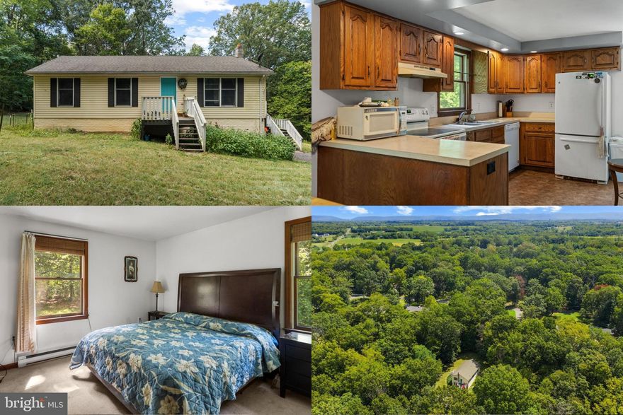 Tucked away between Inwood and Charles Town just off Route 51, 6550 Middleway Pike offers a rare combination of privacy, natural beauty, and convenience. This charming property sits on a spacious lot that backs to mature trees, providing a peaceful, wooded backdrop and a true sense of seclusion—perfect for those looking to escape the hustle and bustle without sacrificing access to nearby amenities. A long private driveway welcomes you home, offering ample parking and reinforcing the home’s retreat-like feel. Inside, the walkout-level basement offers incredible potential for a variety of uses—whether you envision a home gym, recreation room, workshop, or additional living space tailored to your needs. Adding to its appeal, this property is unrestricted, allowing for the keeping of farm animals, gardening, or other personal uses without the limitations often found in planned communities. Whether you're enjoying quiet mornings with coffee surrounded by nature or hosting gatherings in a tranquil setting, this property is ideal as a full-time residence or a relaxing weekend getaway. Don’t miss the opportunity to own this peaceful haven in one of Kearneysville’s most desirable locations!