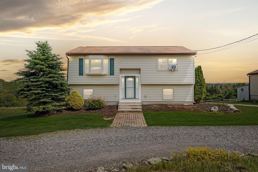 THIS IS THE ONE! Vast 10.39-ACRE FARMETTE with breathtaking MOUNTAIN VIEWS in Pleasant Valley School District! This 3-bedroom, 2-bath home offers two spacious living areas, each with a cozy propane fireplace and warm wood flooring. Enjoy seamless indoor/outdoor living with two composite decks and a heated three-season room, perfect for relaxing and taking in the views year-round. Modern upgrades include mostly PEX plumbing and a whole-house GENERATOR for added peace of mind. Outside, you'll find a detached 2-car garage, two storage sheds, and a barn—ideal for animals, hobbies, or storage. Whether you're dreaming of a HOMESTEAD or a peaceful country retreat, this property is full of potential. Be sure to check out the virtual and video tours. Schedule your private showing today!