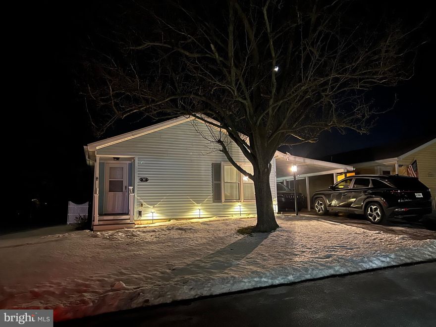 COMING SOON.............This Beautifully Remodeled home leaves nothing for you to do but Move Right In !   Looking for a Senior Community ?  Look no farther.    In 2024, many upgrades were done to this home, including a completely remodeled  Kitchen with all  new stainless steel appliances. The new Waterproof Laminate flooring was installed in the main living areas.  The bedrooms are both original carpeting.   There's a new energy efficient Rheem Heat Pump with Central Air that these folks  also installed, so the home is very comfortable Summer and Winter and affordable to maintain.  There are baseboard electric heaters, for weather like we are experiencing right now, as a back up to the Heat Pump.  The primary bedroom has it's own bath with Shower Stall and the Hall bath has Tub/Shower Combination.  Both Bathrooms have had recent upgrades, including comfort height toilets.  Ample closet space in both bedrooms, which feature walk in closets.    Seller would like settlement to be after March 31st, to accommodate the move to their new home. A One Year Home Warranty is offered as a Peace of Mind in buying this home.  The Buyer Must be approved by Management, and Rules and Regulations as well as the application are listed under Documents.  There is a $10 increase in the Lot Rent Effective April 1st.   This home is priced for a quick sale, so call now to get your appointment scheduled before someone else grabs this Beauty !