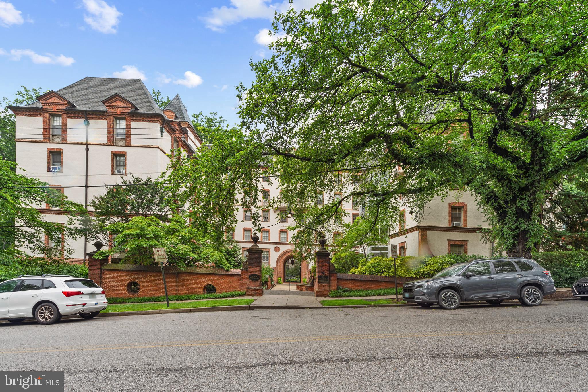 Welcome to 6 Upland Road, Unit F-2 — a gracious and beautifully appointed residence nestled in the heart of Roland Park, one of Baltimore’s most distinguished and architecturally rich neighborhoods. Originally designed as a 3-bedroom, 2-bath home, the current owners thoughtfully reimagined the layout—transforming one bedroom into a formal dining room and the original dining room into a warm and inviting family room. The floor plan can easily be returned to its original design, offering flexibility to suit your lifestyle.
Rich hardwood floors flow throughout the home, complementing the updated kitchen, which features granite countertops, stainless steel appliances, abundant cabinetry, and a custom built-in desk. The living room and family room are both enhanced by elegant built-in shelving, while plantation shutters throughout add timeless sophistication. A gas fireplace in the living room adds a lovely focal point. The apartment features numerous generous closets, all outfitted with organizing systems. Natural light from three directions make this unit feel bright and open.
Both bedrooms are generously proportioned, offering serene retreats. The two full bathrooms are beautifully appointed—one with a walk-in shower enclosed in glass, the other with a tub/shower combination, also with glass doors. An additional study provides a quiet and refined space for work or reading. This apartment features a stacked washer and dryer.
A deeded, assigned garage parking space offers the convenience of city living with the ease of private access. In the building basement, a large private storage unit with 2 windows provides plenty of room for luggage, bicycles, seasonal decorations, etc. It is possible to enter the building and unit without stairs from the rear entry. The unit is served by an elevator with only 2 units per floor.
Roland Park is an amazing, historic neighborhood, originally laid out by Frederick Law Olmstead. Its charming homes, windy streets, and miles of foot paths make it one of Baltimore's most treasured neighborhoods. This condo is just a short walk to the fine dining of Petit Louis, the casual dining of Johnny's, Eddies Grocery (who will also deliver!), Starbucks, the Public Library, numerous shops, etc! Walk to Johns Hopkins main campus or Hampden with all its fun shops and restaurants,
Classic in style and thoughtfully updated, this Roland Park gem offers the perfect blend of charm, comfort, and understated elegance. 6 Upland is proud to be celebrating its 100 birthday this month!