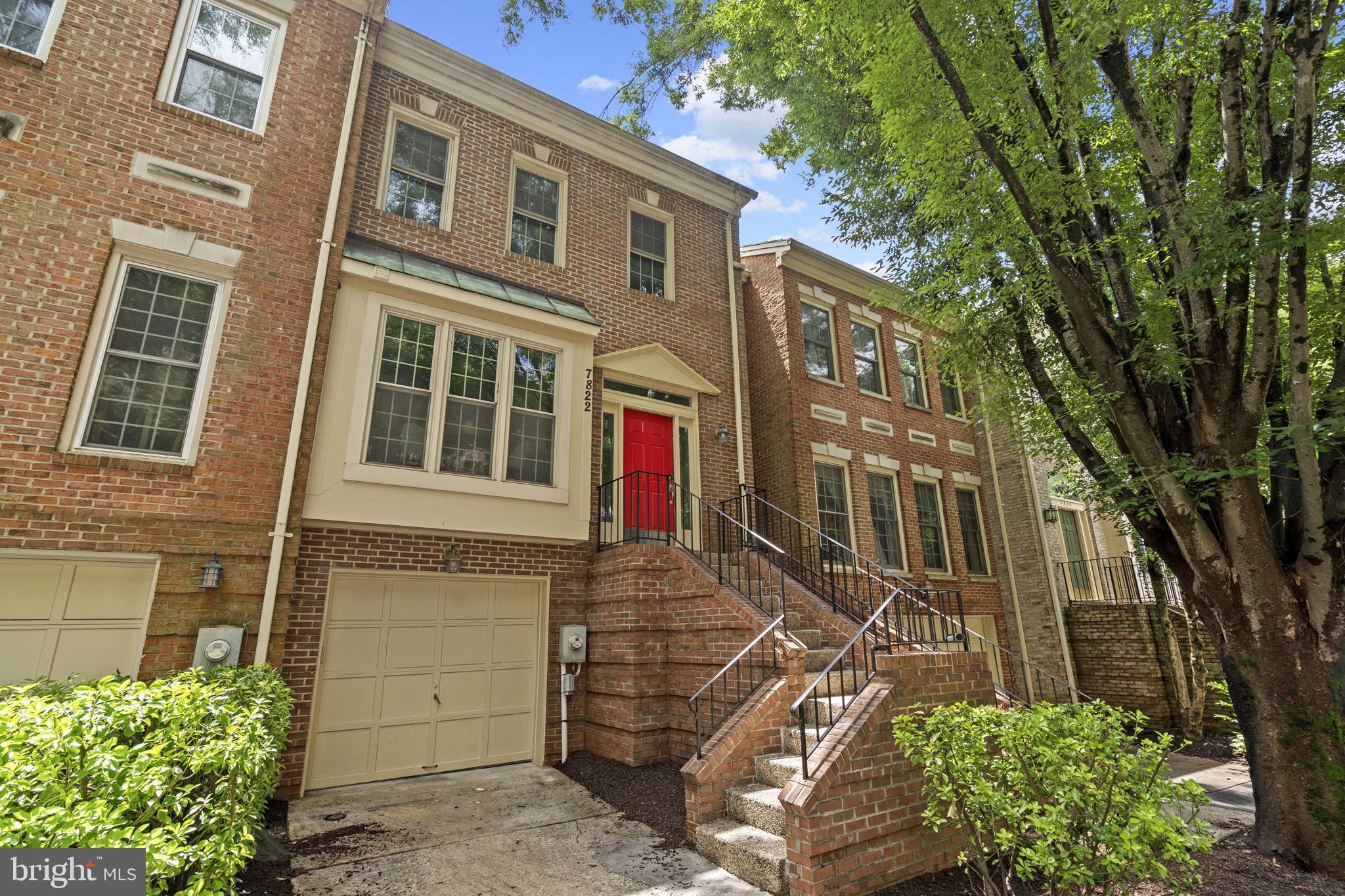 Welcome to this rarely available, largely renovated all-brick 3-level garage townhome. Ideally situated at the end of a beautiful, secluded tree-lined cul-de-sac in the highly sought-after Stonecrest of Potomac community backing to Cabin John Park and within walking distance of the newly revitalized Cabin John Village. This spacious home offers stylish living space, blending classic charm with modern upgrades. Located in the Winston Churchill School District, this home provides the perfect combination of convenience, comfort, and natural beauty.
The main level features a marble foyer, a striking entirely renovated eat-in kitchen with floor-to-ceiling windows, quartz countertops, custom cabinetry, new appliances, and modern tile flooring. Hardwood floors lead to the formal dining room which boasts crown molding and decorative millwork and arched wood columns that open to a step-down living room with a cozy wood-burning fireplace with marble surround, and light-filled floor-to-ceiling windows. Glass French doors lead to a private fenced-in slate patio, perfect for outdoor entertaining. A newly renovated half bath completes this level.
Upstairs, beautiful hardwood floors continue throughout three spacious bedrooms with vaulted ceilings and abundant natural light. The upper level is brightened by multiple skylights, including one in the hallway and another in the luxurious primary suite spa bathroom. The (2022) primary bath features a Porcelanosa double vanity with KRION Solid Surface sinks and countertop, freestanding Wyndham Collection soaking tub with center drain, walk-in thick glass rainfall shower with custom pebbled shower flooring and niche, skylight, custom lighting, and Grohe chrome fixtures throughout.
The fully renovated upstairs hall bath (2022) includes updated tilework, vanity, niche, lighting, and sliding glass shower doors. One of the secondary bedrooms includes custom California Closet bookshelves, ideal for a home office or reading retreat. Additional storage is available via pull-down attic access.
The finished lower level offers a generous recreation room with custom built-in shelving, new ceramic flooring, a second wood-burning fireplace, a stylish half bath renovated in 2025 with Porcelanosa vanity, mirror and sink, new flooring, and a spacious laundry/utility room with new flooring, utility sink, and 2023 energy-efficient washer and dryer. This level also provides direct access to the one-car garage.
Recent upgrades include a new cedar shake roof (2021), new and refinished hardwood floors (2023), recessed lighting throughout (2025), HVAC (2016, serviced 2025), water heater (2017), energy-efficient windows and appliances (2022–2023), copper piping for main and internal waterlines, and ceramic tile flooring in the basement (2023). The fenced rear patio was re-leveled and refinished in 2025.
From this home enjoy proximity to downtown Bethesda, Washington, DC (via Metro at Grosvenor), Strathmore Music Center, NIH, Walter Reed, Suburban and Shady Grove Hospitals, Westfield Montgomery Mall, Great Falls National Park, Potomac Village, Cabin John Village and Tyson’s Corner Virginia. All of this plus nearby access to 5,000+ acre Cabin John Regional Park with trails, playgrounds, indoor tennis, an ice rink, miniature train, and more.
Don’t miss this rare opportunity to own a beautifully updated, move-in-ready townhome in one of Potomac’s most desirable locations. A peaceful retreat surrounded by nature—yet just minutes to world-class shopping, dining, and transit—7822 Oracle Place is ready to welcome you home.