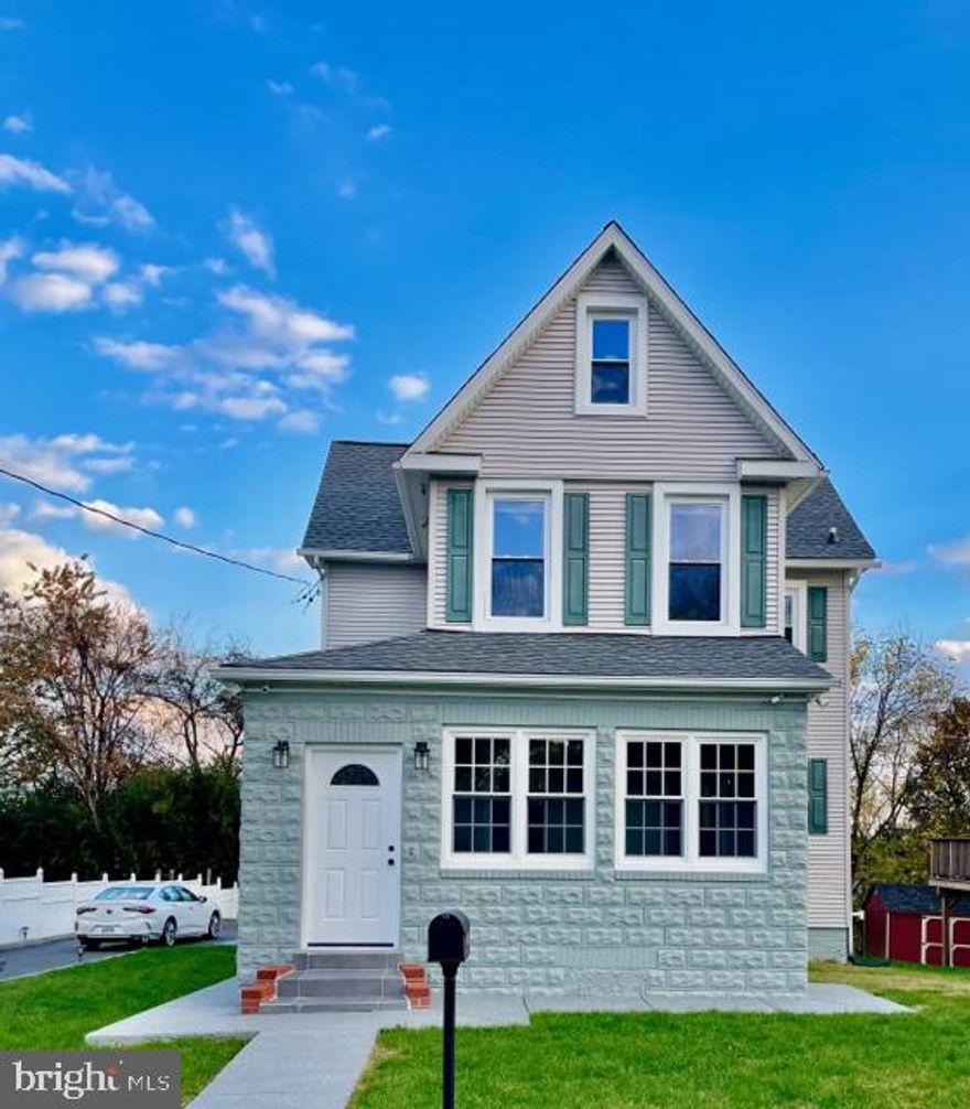 This stunning home in a sought-after locale offers 4 bedrooms and 2 full baths, plus a bonus room that could be used as a 5th bedroom, an office, or become an oversized primary bedroom with walk-in closet and private bath. Impeccably maintained, the hardwood runs throughout the main and second levels, and carpet is featured on the third floor. Everything is 4 years old, including the water heater, HVAC, floors, and appliances. Kitchens and baths were stylishly remodeled, and the roof is brand new - just a week old! The kitchen boasts a grand island perfect for family gatherings. Enjoy separate dining and living rooms, and lounging amidst recessed lighting from main to second floor. Park 6 cars easily in the driveway, plus an extra building to use as storage - or for extra income by finishing it off. Easily access major highways 695 & 95, along with stores, eateries, and all that White Marsh provides.  Made your appointment today! You must see it!