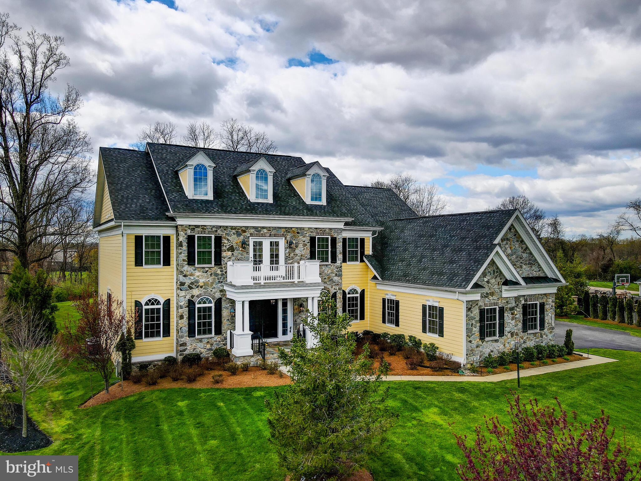 Back on the market, buyer's financing fell through! Backing to Schooley Mill Park this stunning stone and HardiePlank customized NV Monticello II estate home sited on a level one-acre premium lot makes an immediate statement. This luxury and stylish home features an elegant entry foyer, with a curved staircase and a second-floor overlook that frames the open floor plan. Formal spaces spill into casual family areas including a dramatic two-story family room with a floor-to-ceiling stone fireplace that flows to the casual dining area, conservatory, and gourmet kitchen, a chef's paradise with expansive counter space, 5-burner gas cooktop, 2-dishwashers, eating island, and walk-in pantry. Additional main level features include a double-door main level office. a large powder room, a butlers pantry, and a mudroom with built-in cubbies, service entry, and access to the oversized 3-car side entry garage. Upstairs, your magnificent primary suite includes dual closets, a sitting room with doors to a private rear balcony, a spa-like bath with 12-foot long Roman shower with dual showerheads, a soaking tub, dual vanities, and a large water closet. Completing the upper living level is an open sitting area with access to the front balcony, three additional bedrooms each with ensuite baths and walk-in closets, and the laundry room with built-in cabinets, utility tub, and furnace closet. A fully finished lower level offers a generously sized recreation room with a 2nd kitchen, a media room, a 5th bedroom with a full-sized window and adjacent full bath, a storage room, a mechanical room, and a wide walk-up to the level rear yard. Outdoor features include a large covered rear deck with steps to the beautiful and spacious stone patio with a built-in fire pit and seating. The premium 1-acre lot with room for a pool backs to Schooley Mill Park which offers a wide variety of habitats including wetlands, woodlands, and meadows. Wildlife thrives in these meadows that are maintained in a natural state to provide food, cover, and nest sites. This hidden gem is a peaceful place to relax and enjoy nature. Park amenities include a playground, a 3-ring equestrian area, cricket/baseball/softball fields, cycling/outdoor trails, and basketball/tennis courts. This impressive 9,000 sq. ft. estate home with scenic views from every window is truly a very special offering not to be missed!