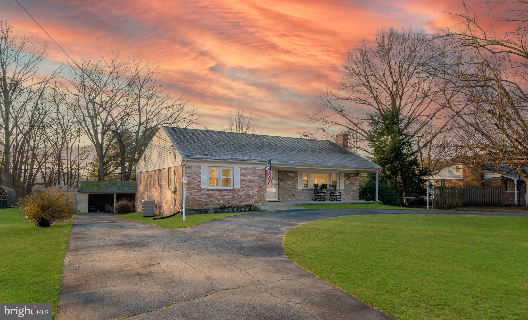 This one won't disappoint! A business owner's dream... 4 car attached garage, and 6 detached carport! Feel right at home as soon as you walk through the door... family room off kitchen & formal dining room will make entertaining a breeze. Prep meals in the large open kitchen, or enjoy movie night in the living room with the cozy fireplace. Rooms are spacious...3 on the main level and 1 on the lower level. 2 full bathrooms upstairs, 1 full bathroom downstairs. Finished basement is open and perfect for a rec room, play room, game room, etc. No HOA! Close to shopping, dining, theaters, and more! SEE AGENT REMARKS!!!!