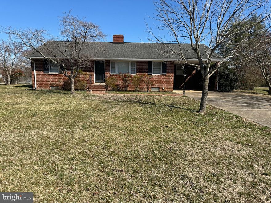 Charming 3-Bedroom Brick Rambler on a Prime Corner Lot!
Welcome to your new home! This delightful 3-bedroom, 1-bath brick rambler is situated on a spacious corner lot, offering both curb appeal and a sense of privacy. With its classic brick exterior this property exudes warmth and character.  As you step inside, you’ll be greeted by a bright and airy living room that flows seamlessly into the dining area, perfect for family gatherings and entertaining friends. The kitchen is conveniently located with potential for updates to make it your own.  The three cozy bedrooms offer comfort and tranquility. The shared bath is convenient for all 3 bedrooms.  There is a Whole House Fan located in the hallway by the bedrooms that you can turn on to bring in cool air during Spring and Fall months.  One of the standout features of this home is the full, partially finished basement. This versatile space has a large recreation room with a fireplace and a pool table that conveys.  Another section of the basement has a great workshop area with built in shelves and includes the washer and dryer with a sink.
The backyard is spacious for outdoor gatherings and boasts a beautiful slate patio.  The large shed has electricity and space for a workshop with built-in shelves.   Located in a fantastic neighborhood, this property boasts easy access to the commuter rail, making your daily commute a breeze. Additionally, you’re just minutes away from the vibrant downtown Fredericksburg, where you can enjoy shopping, dining, and local attractions.  Don’t miss out on this incredible opportunity to own a charming rambler in a prime location! Schedule your showing today and envision your new life in this lovely home.  This property is being sold "As Is" and inspections are for informational purposes only.  This property will qualify for FHA and VA financing.  Grafton Village does have a community pool if you would like to join it.  Check at the pool for further information.