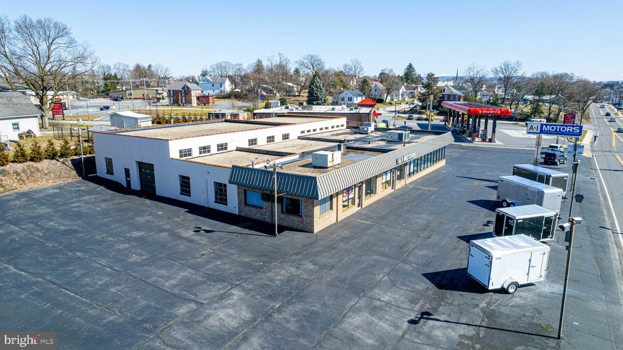 This well maintained commercial building is being now offered publicly for sale for the first time. With over 10,000 square feet of usable space under roof, and over ONE ACRE in the Borough of Chambersburg - this property offers opportunity for a various assortment of ventures. Enjoy excellent exposure and a high traffic count. This property is conveniently located on a main artery. Many uses possible - refer to zoning. This custom built facility offers a mixture of office, meeting, retail/showroom, warehousing and workshop space. The rear workshop / warehouse offers three loading doors and 14 foot ceilings. The possibilities are endless. Will your business be the next to thrive here?